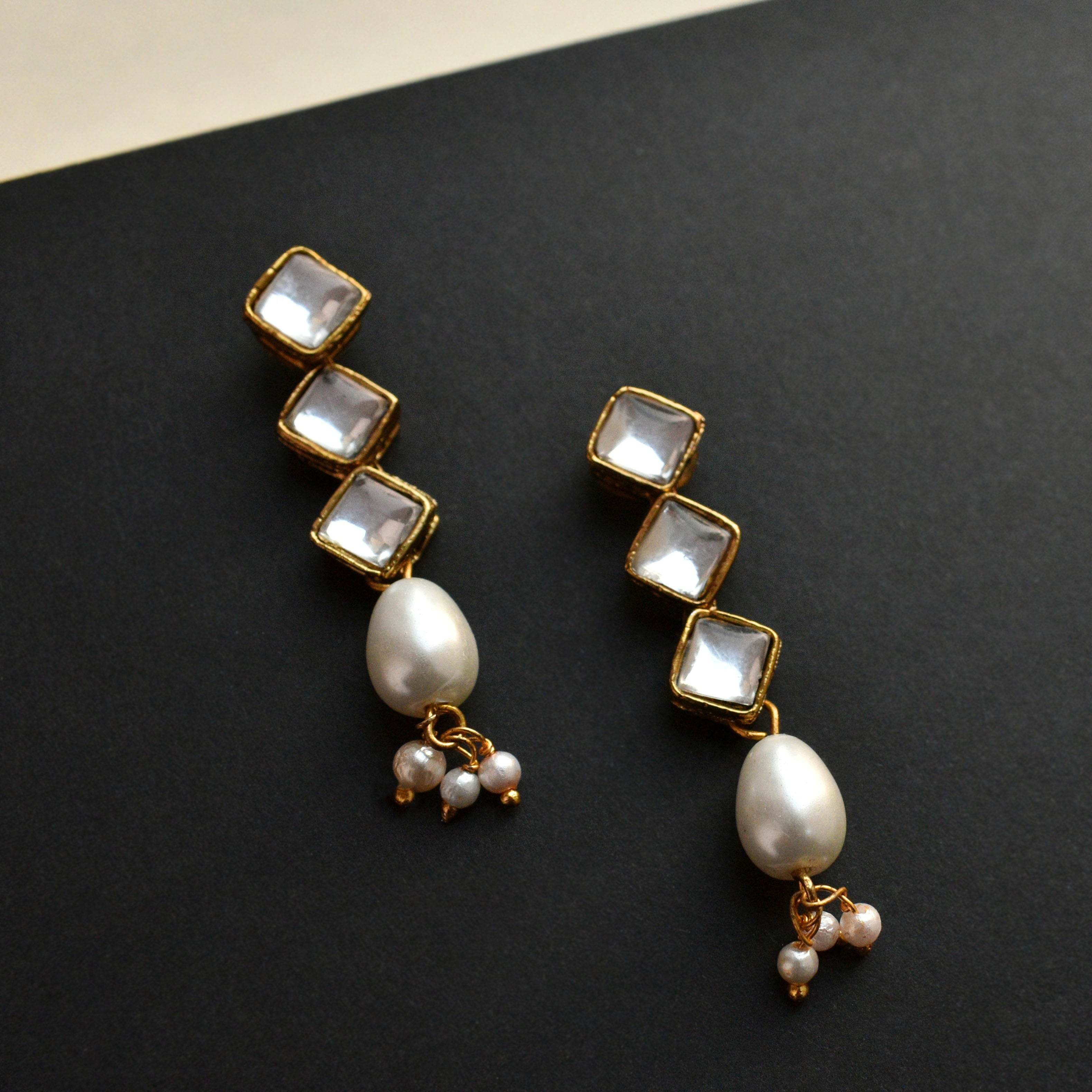 Kundan choker set in gold-tone with matching earrings and long bridal necklace, perfect for wedding functions , festive and bridal wear