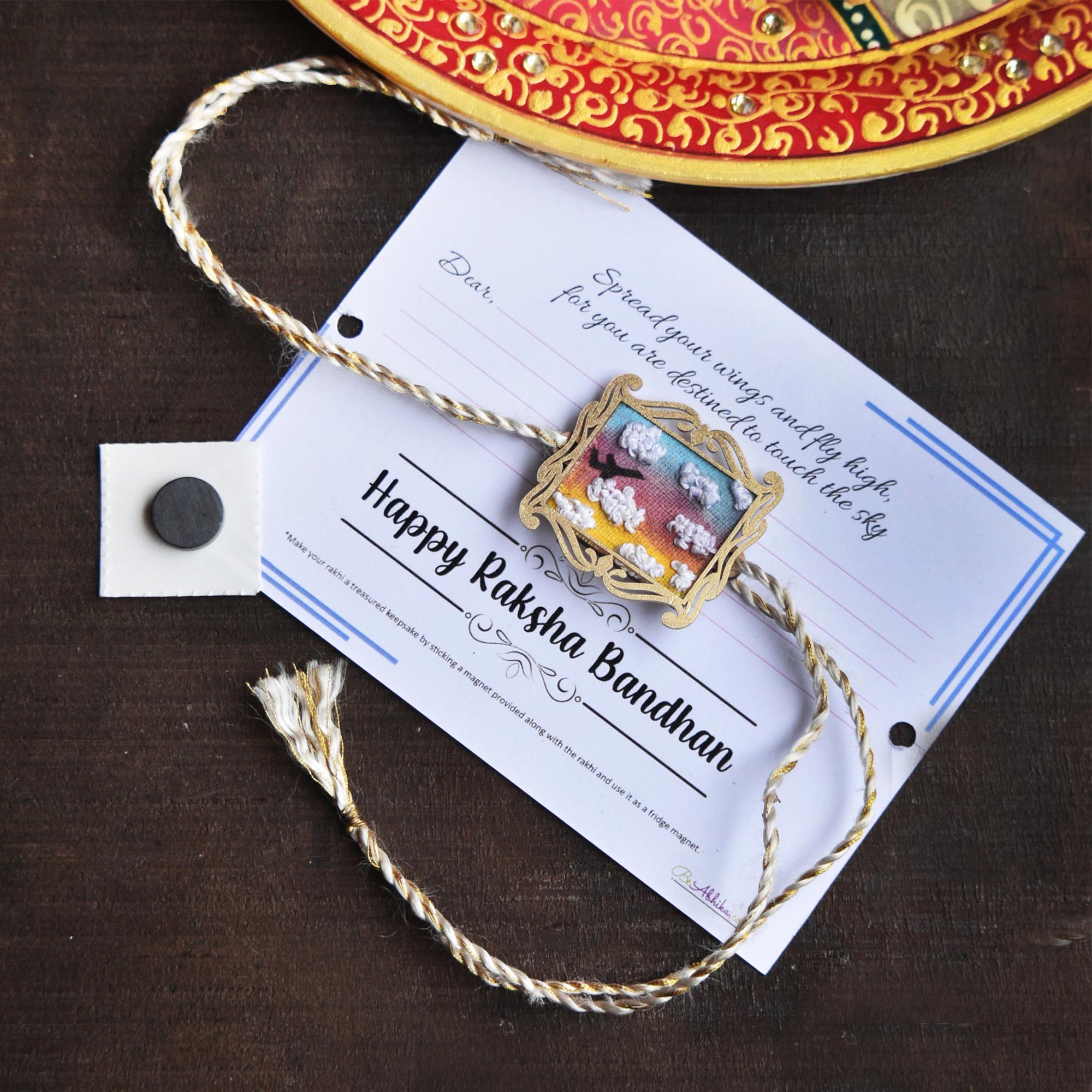 BeAbhika Hand Embroidered Rakhi Sky Fly High Airplane Pilot Bro Rakhi With Fridge Magnet Designer Unqiue Famous Rakhi Lightweight Easy To Tie Rakhi Available At Best Price In India Online COD Available Send Rakhi To Brother Small Brother Big Brother Younger Brother Send Rakhi Abroad With Roli Chawal Capsules