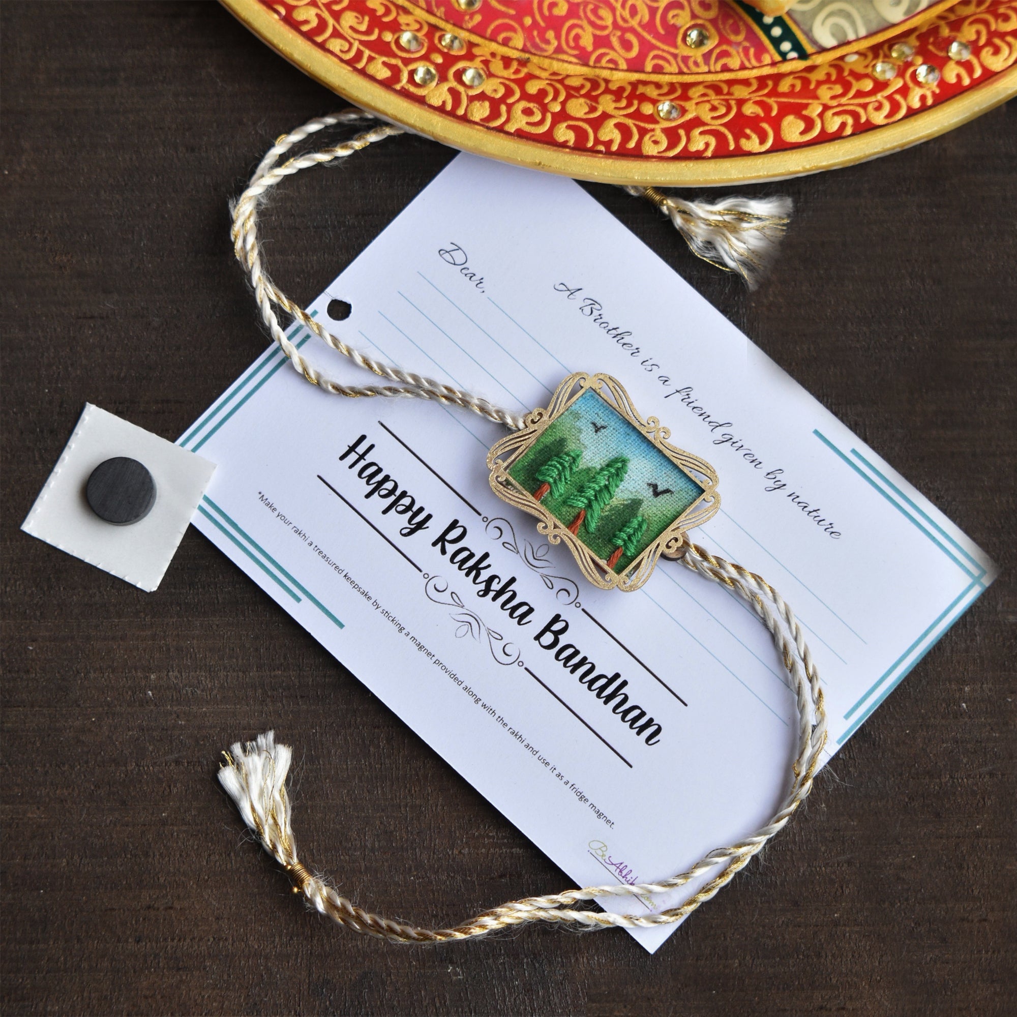BeAbhika Hand Embroidered Rakhi Forest Lover Nature Lover Bro Rakhi With Fridge Magnet Designer Unqiue Famous Rakhi Lightweight Easy To Tie Rakhi Available At Best Price In India Online COD Available Send Rakhi To Brother Small Brother Big Brother Younger Brother Send Rakhi Abroad With Roli Chawal Capsules