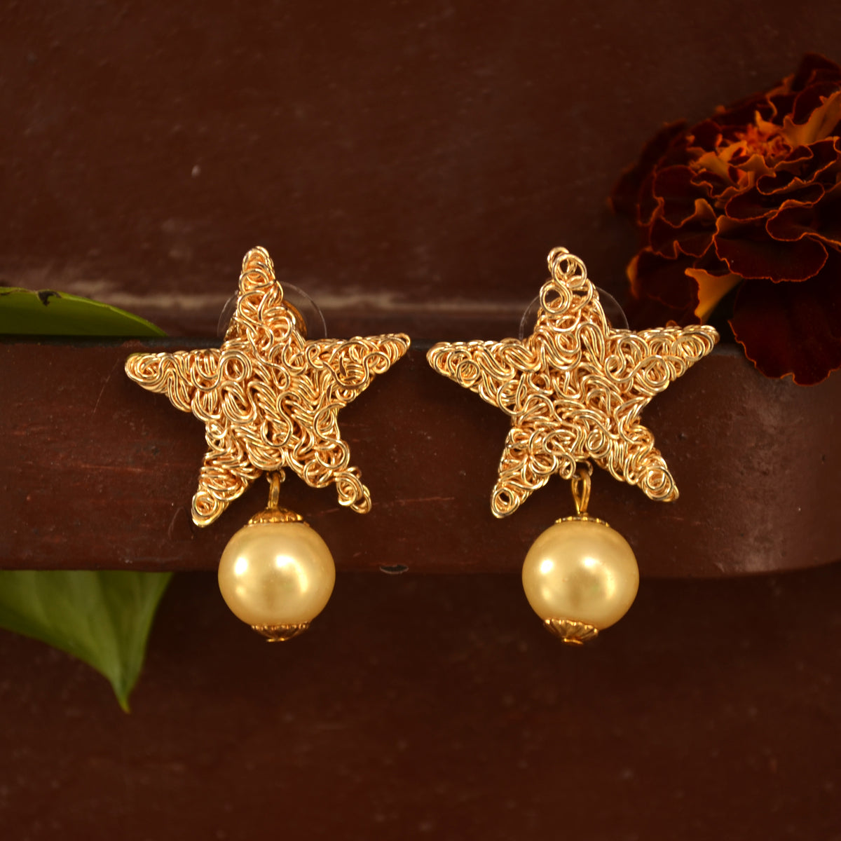 Traditional Kundan earrings in gold-tone, perfect for weddings and festive wear