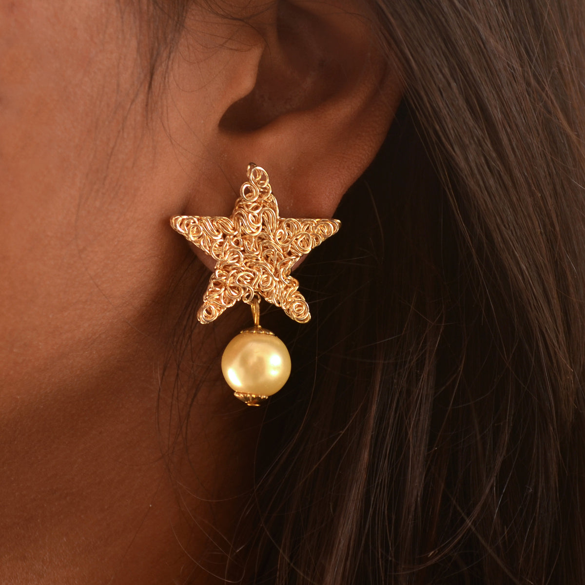 Traditional Kundan earrings in gold-tone, perfect for weddings and festive wear