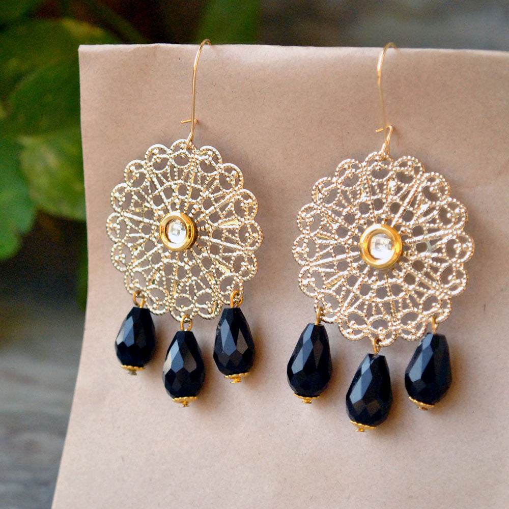 Traditional Kundan earrings in gold-tone, perfect for weddings and festive wear