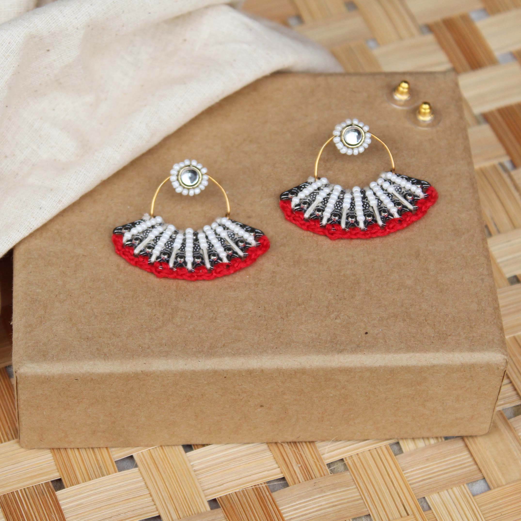 Traditional Kundan earrings in gold-tone, perfect for weddings and festive wear