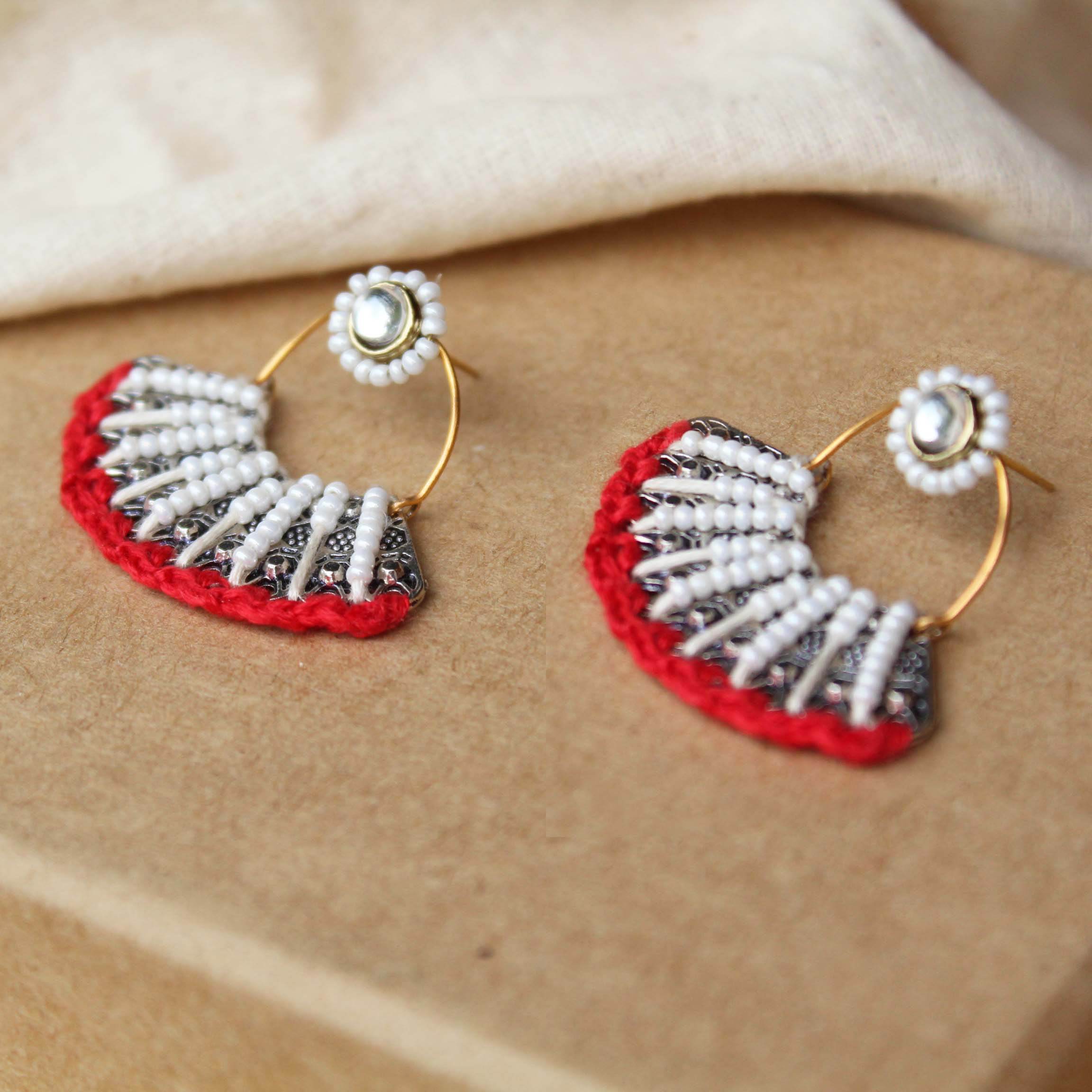 Traditional Kundan earrings in gold-tone, perfect for weddings and festive wear