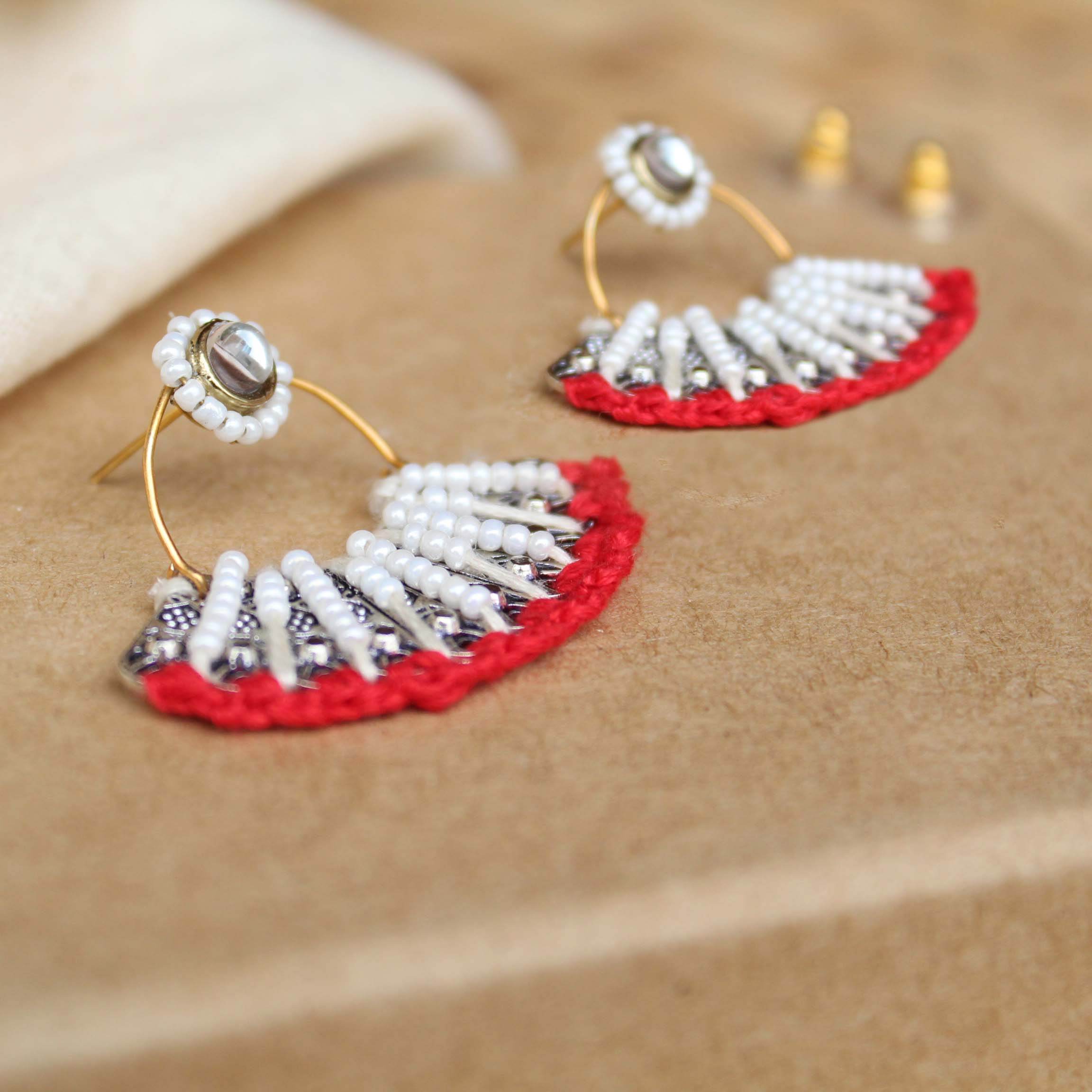 Traditional Kundan earrings in gold-tone, perfect for weddings and festive wear