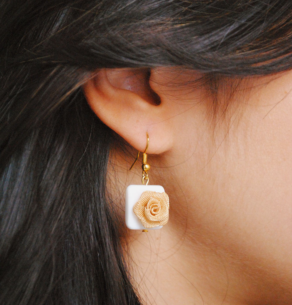 Traditional Kundan earrings in gold-tone, perfect for weddings and festive wear