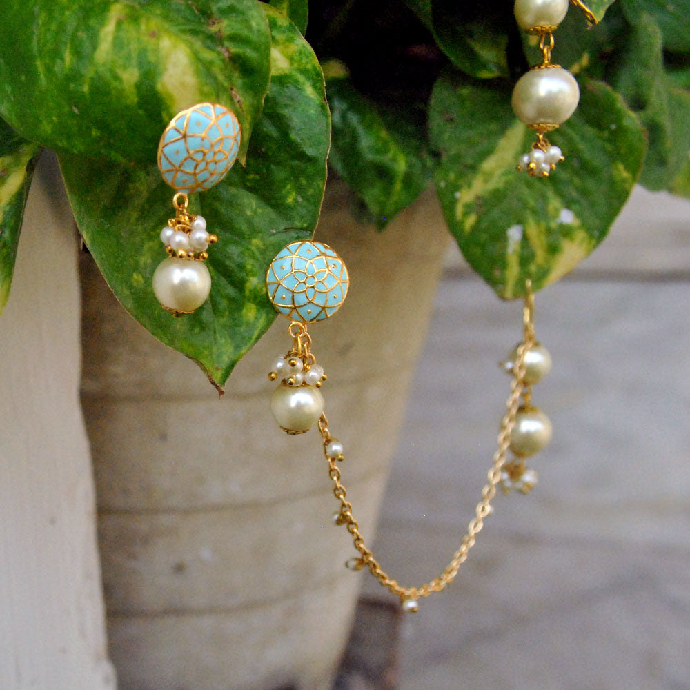 Traditional Kundan earrings in gold-tone, perfect for weddings and festive wear