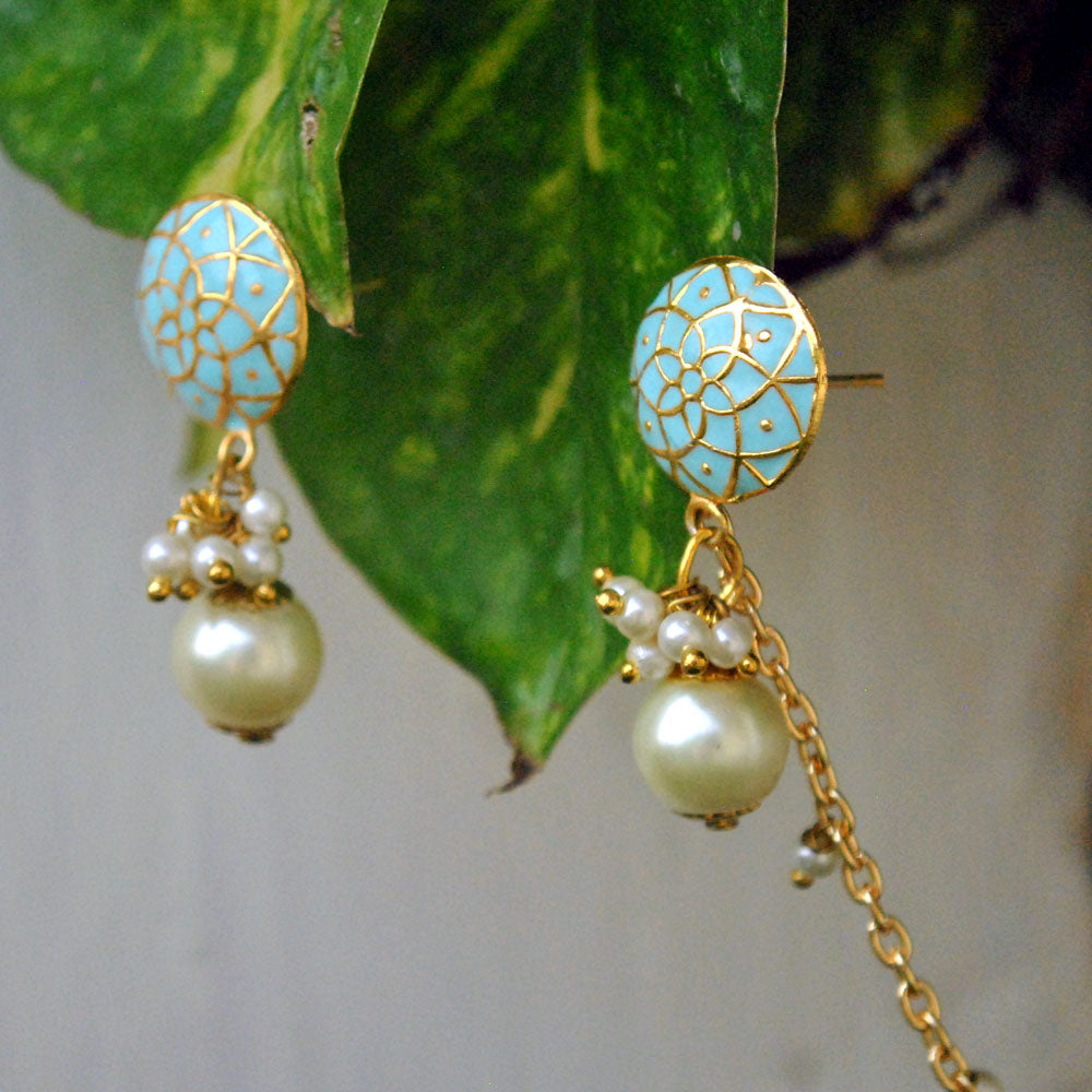 Traditional Kundan earrings in gold-tone, perfect for weddings and festive wear