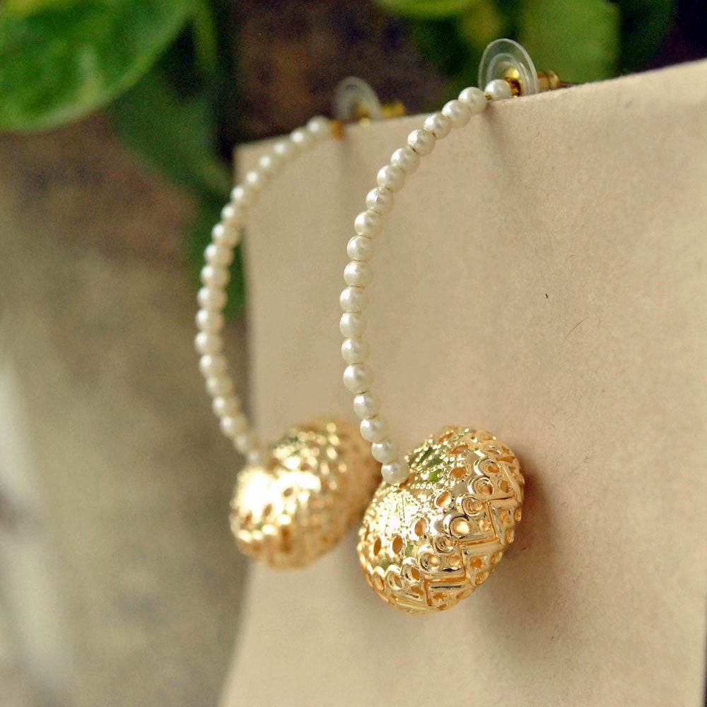 Traditional Kundan earrings in gold-tone, perfect for weddings and festive wear