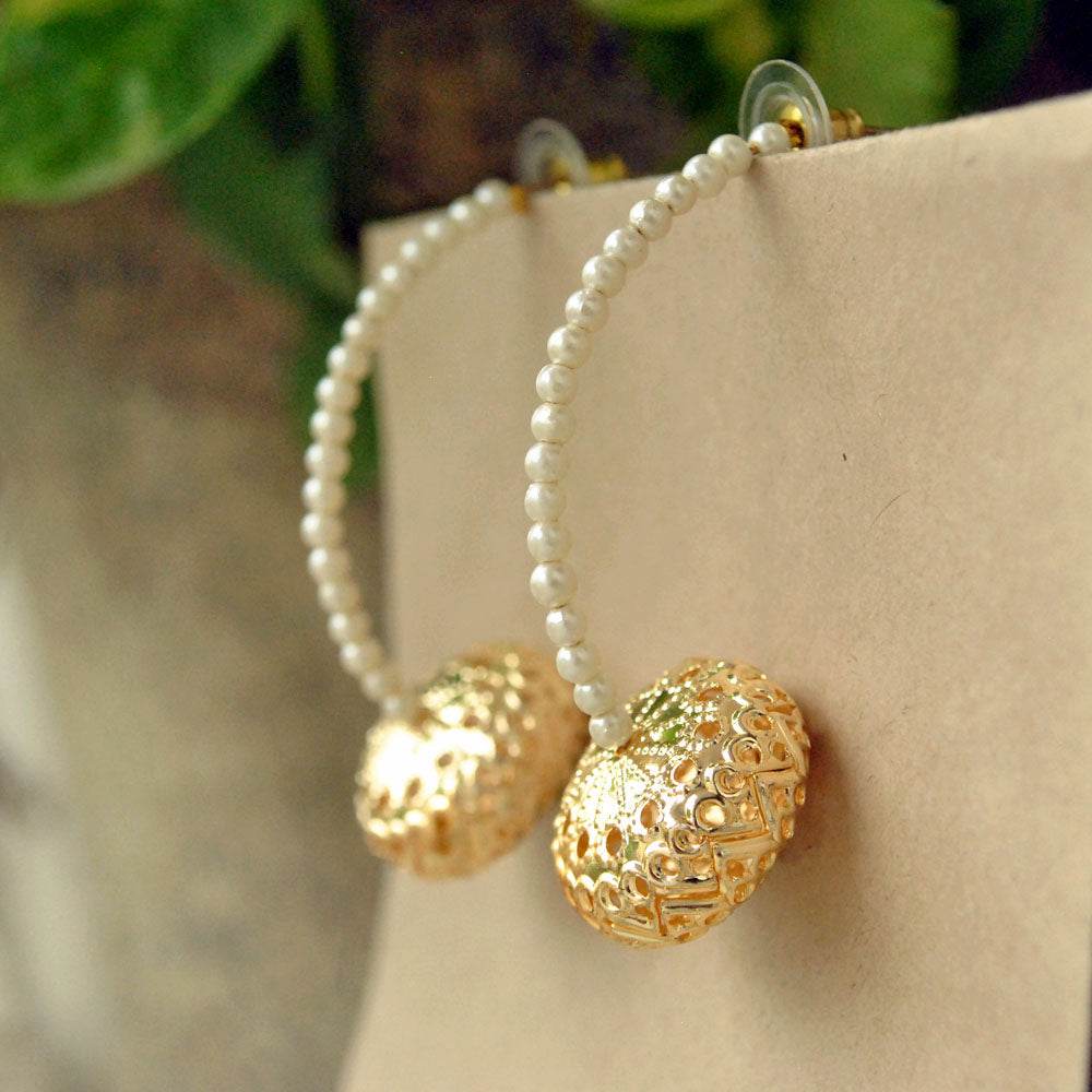 Traditional Kundan earrings in gold-tone, perfect for weddings and festive wear
