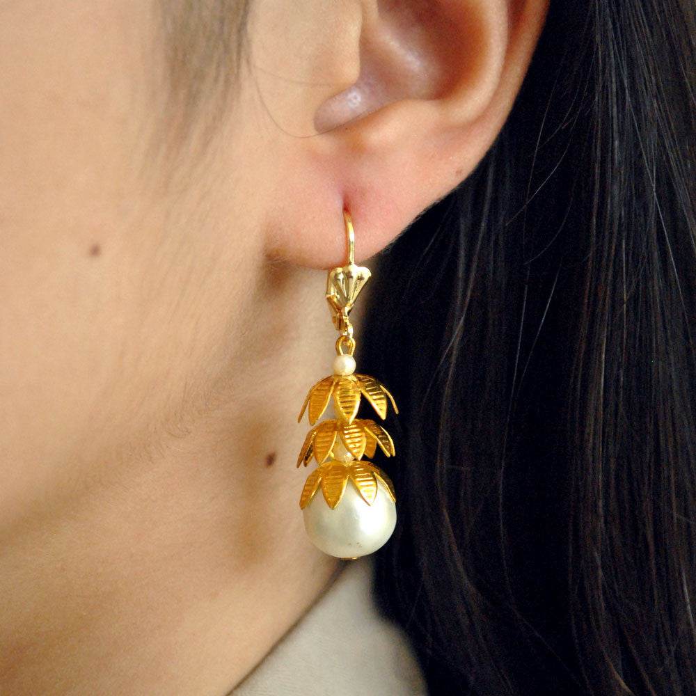 Traditional Kundan earrings in gold-tone, perfect for weddings and festive wear