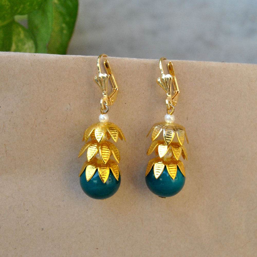 Traditional Kundan earrings in gold-tone, perfect for weddings and festive wear