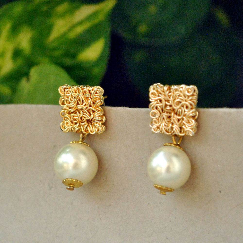 Traditional Kundan earrings in gold-tone, perfect for weddings and festive wear