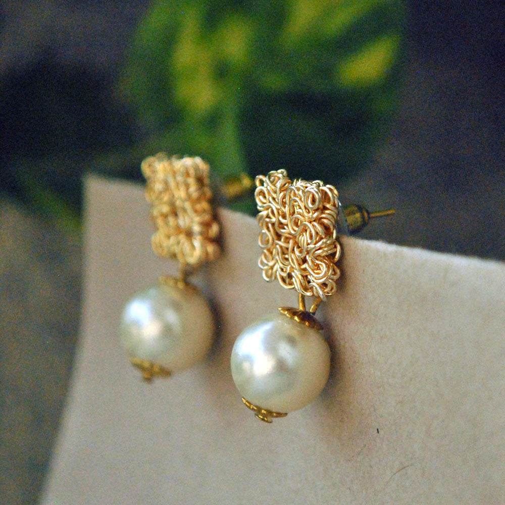 Traditional Kundan earrings in gold-tone, perfect for weddings and festive wear