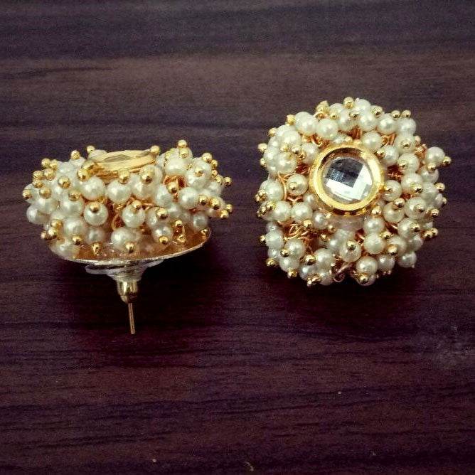 Traditional Kundan earrings in gold-tone, perfect for weddings and festive wear