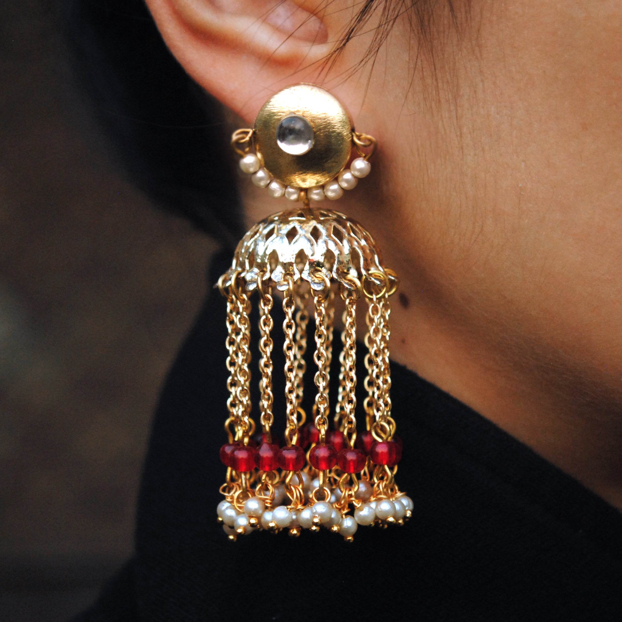 Traditional Kundan earrings in gold-tone, perfect for weddings and festive wear