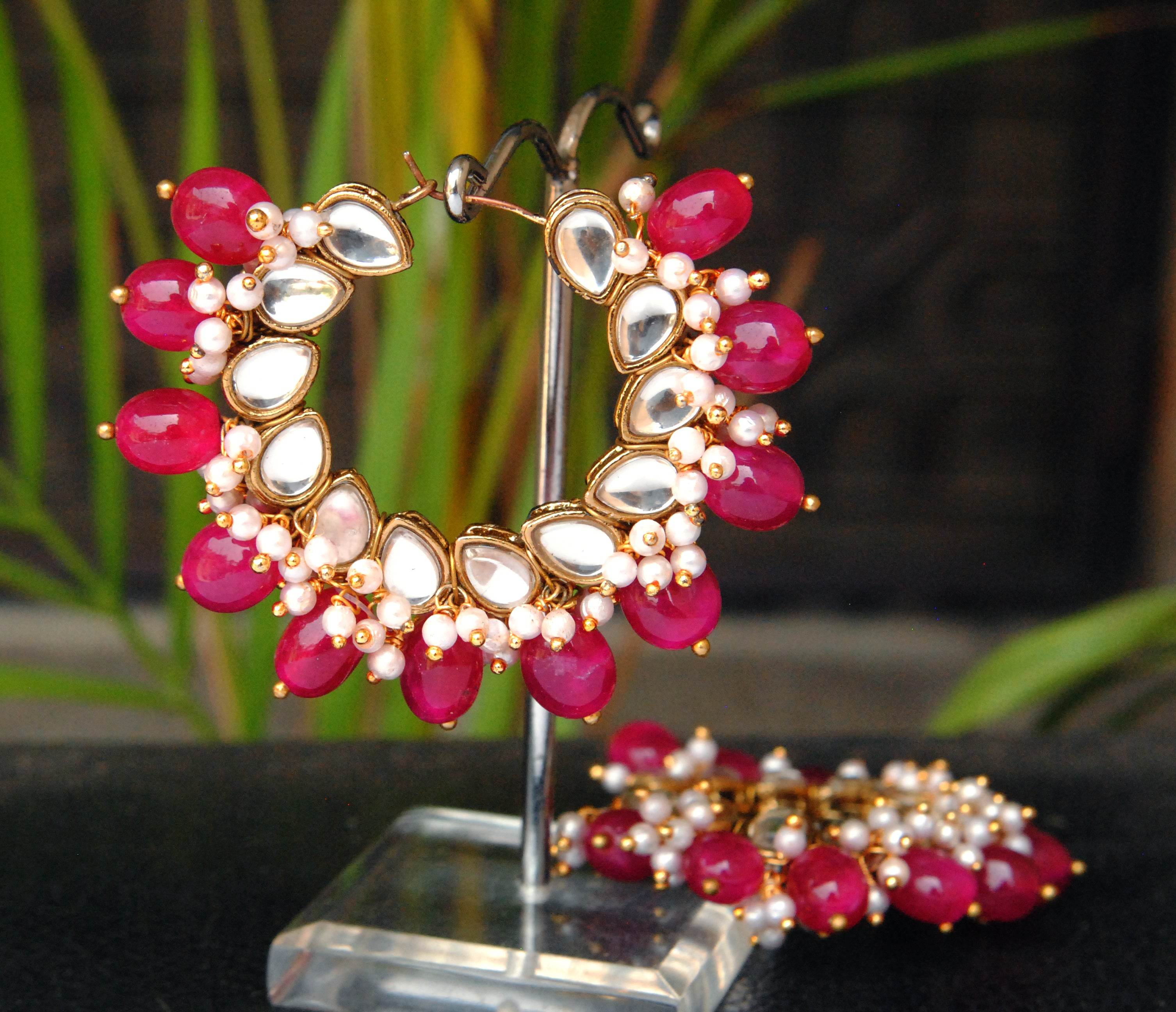 Traditional Kundan earrings in gold-tone, perfect for weddings and festive wear