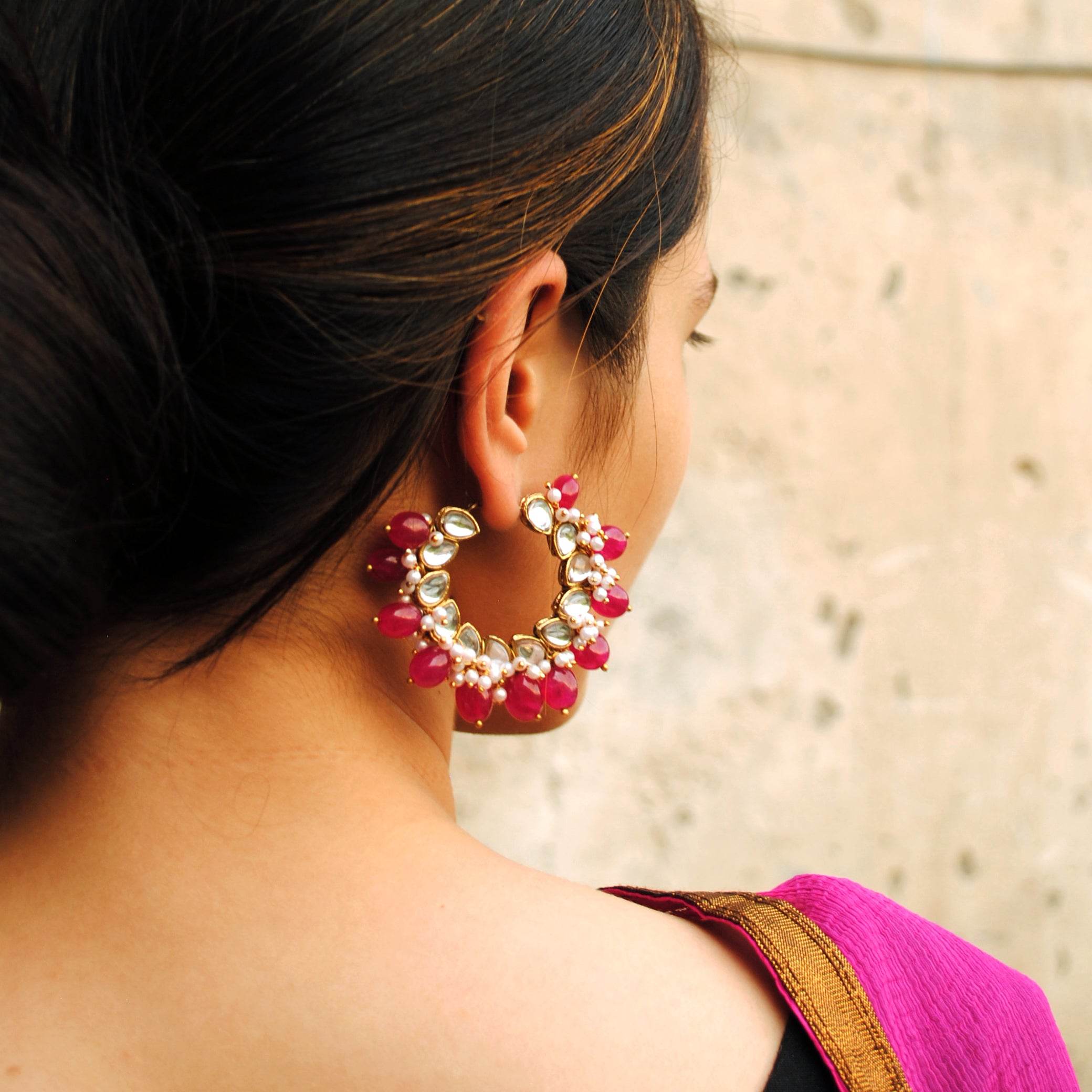 Traditional Kundan earrings in gold-tone, perfect for weddings and festive wear