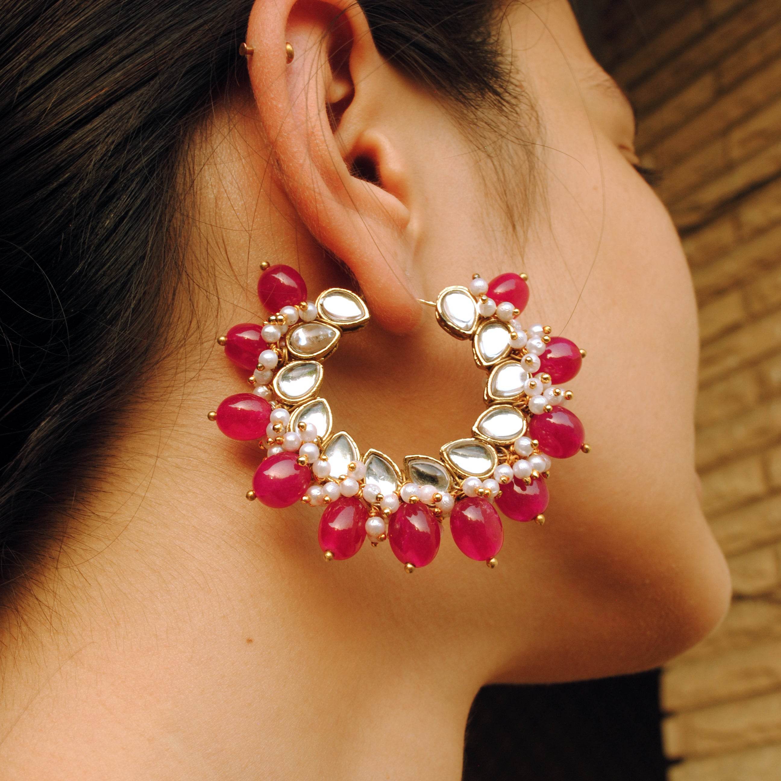 Traditional Kundan earrings in gold-tone, perfect for weddings and festive wear