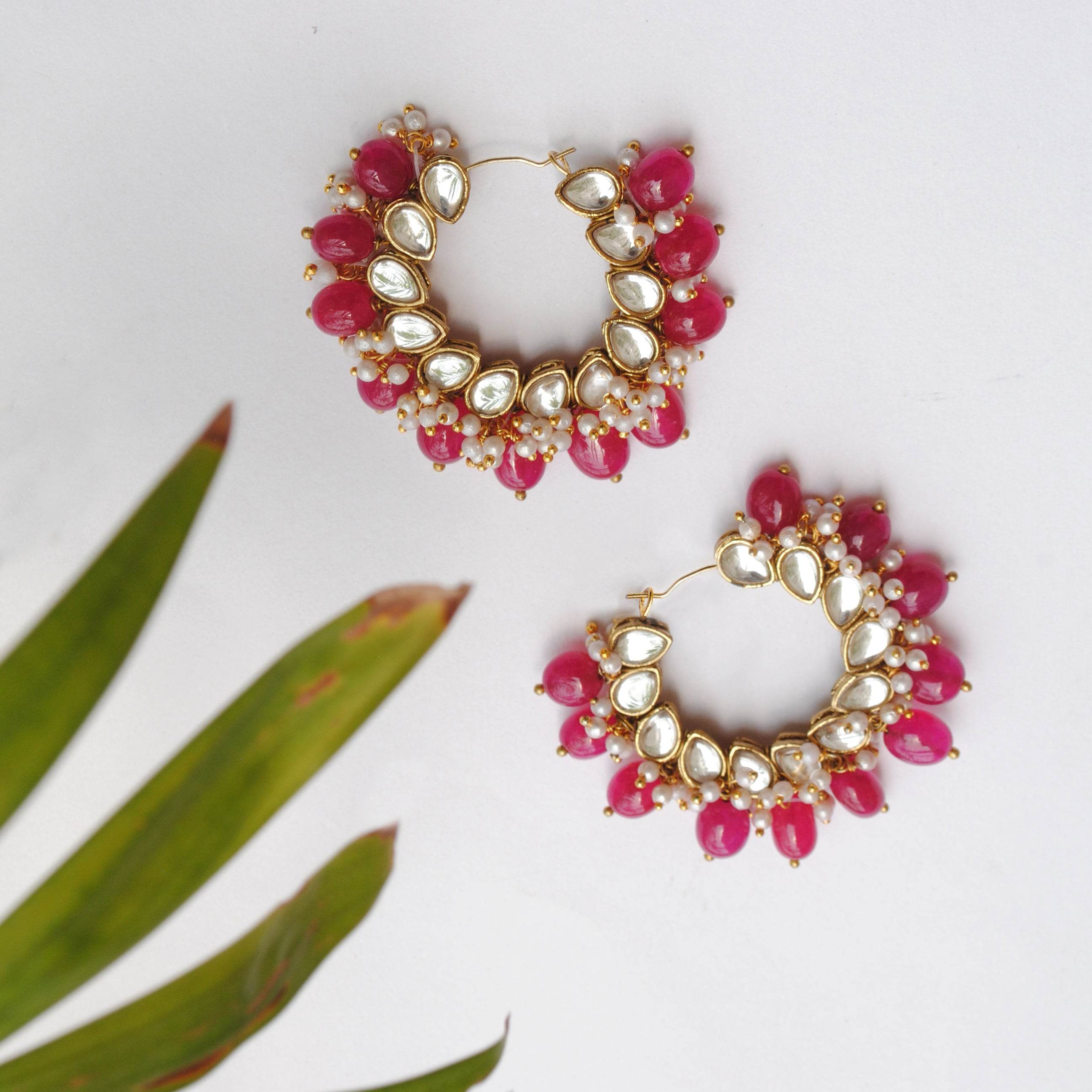 Traditional Kundan earrings in gold-tone, perfect for weddings and festive wear