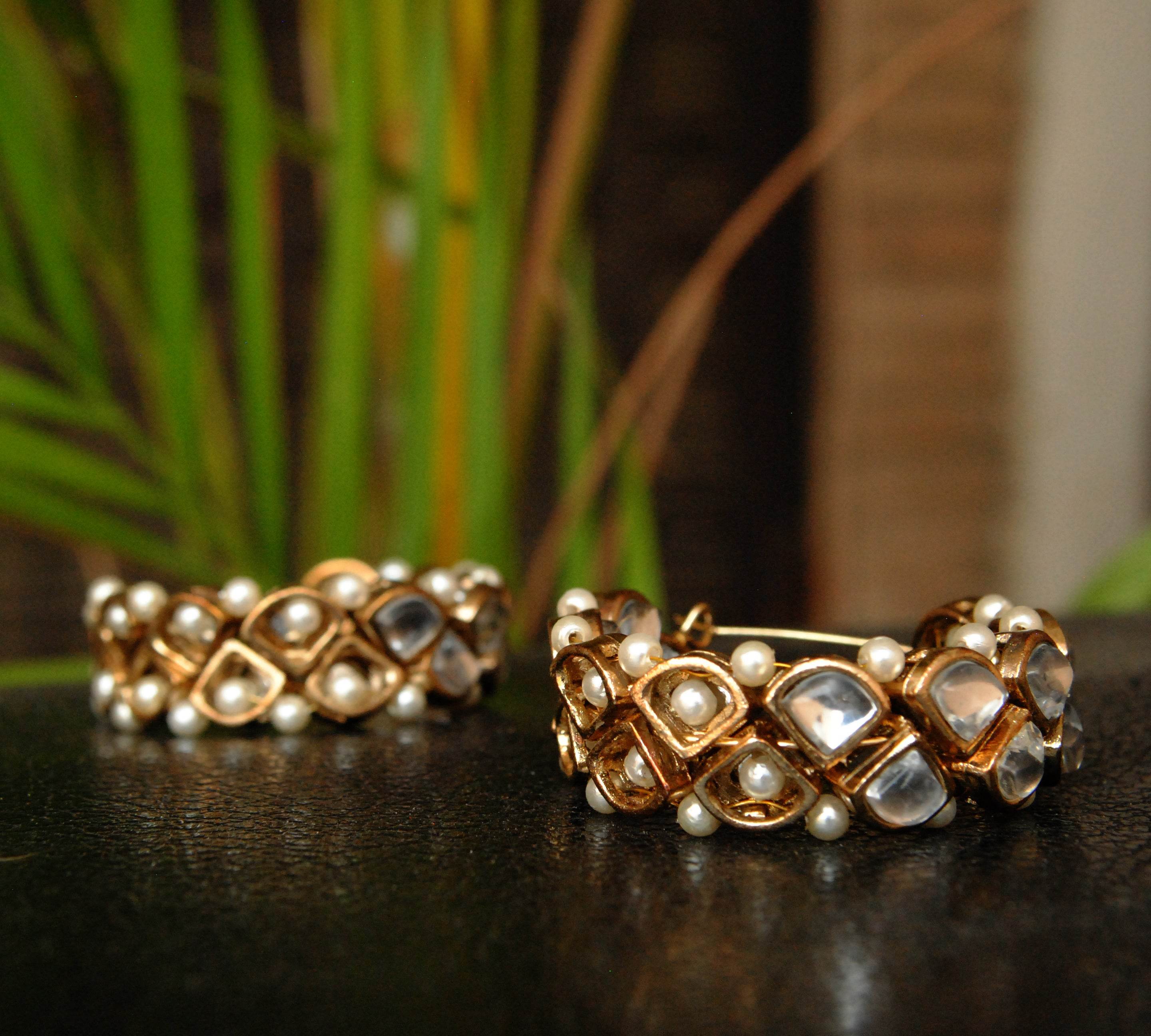 Traditional Kundan earrings in gold-tone, perfect for weddings and festive wear