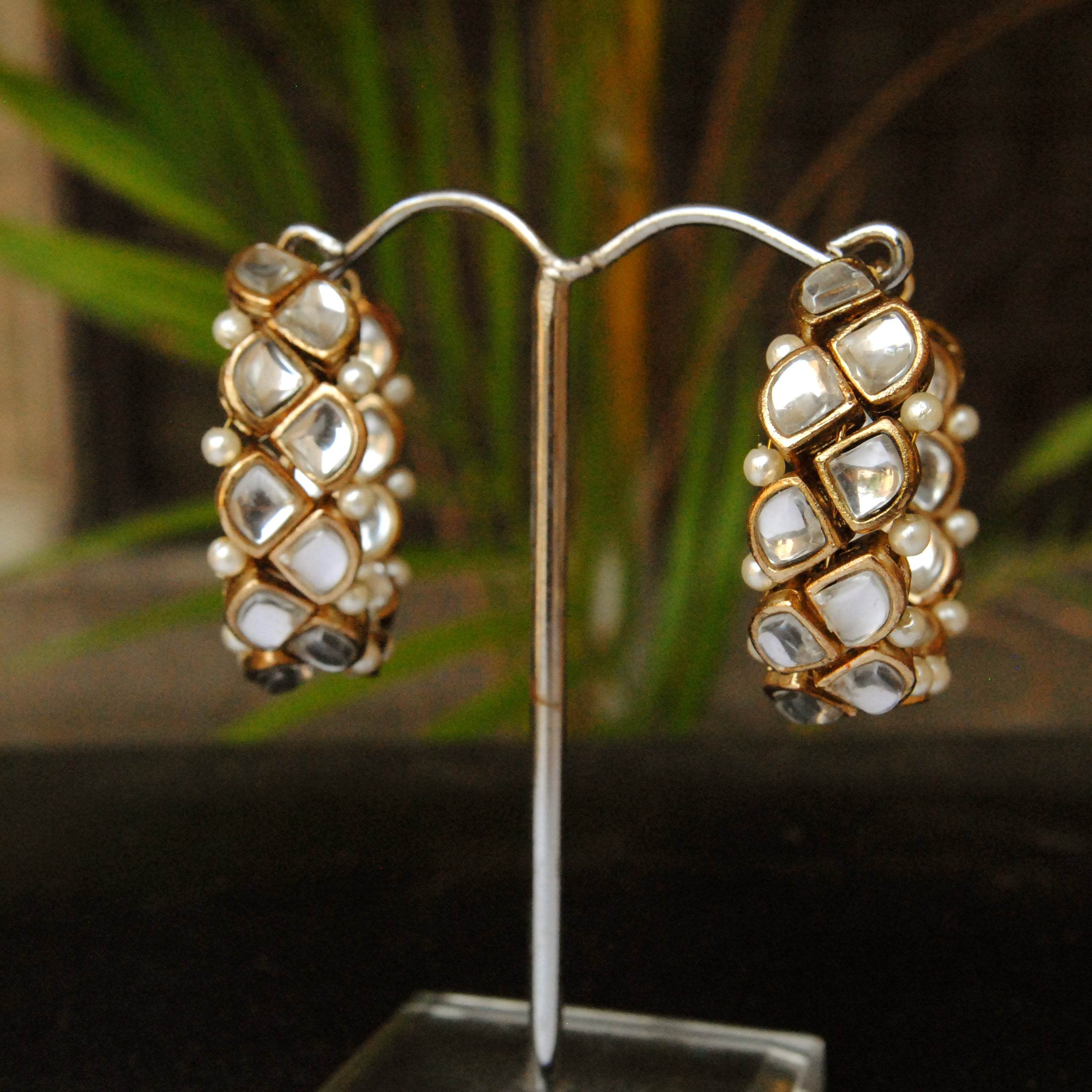 Traditional Kundan earrings in gold-tone, perfect for weddings and festive wear