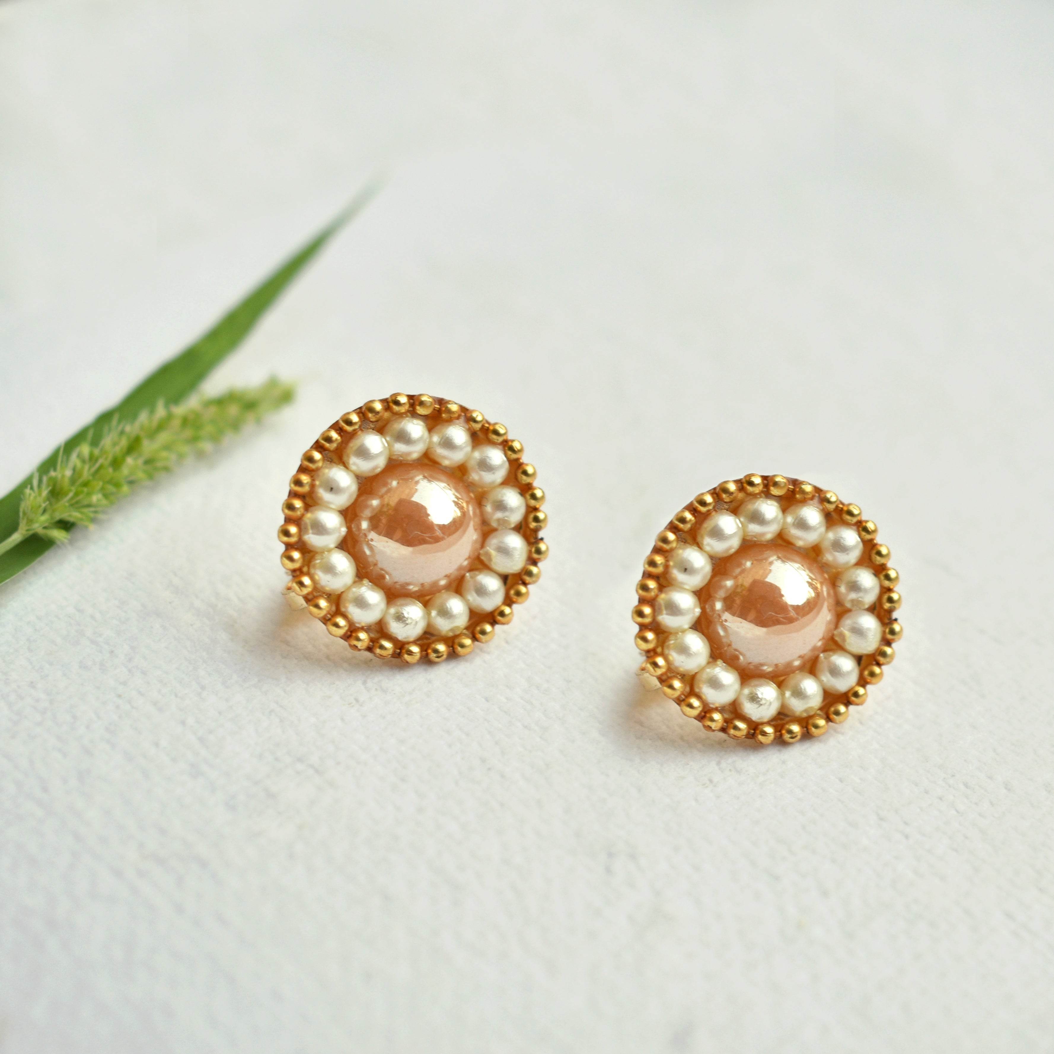 Traditional Kundan earrings in gold-tone, perfect for weddings and festive wear