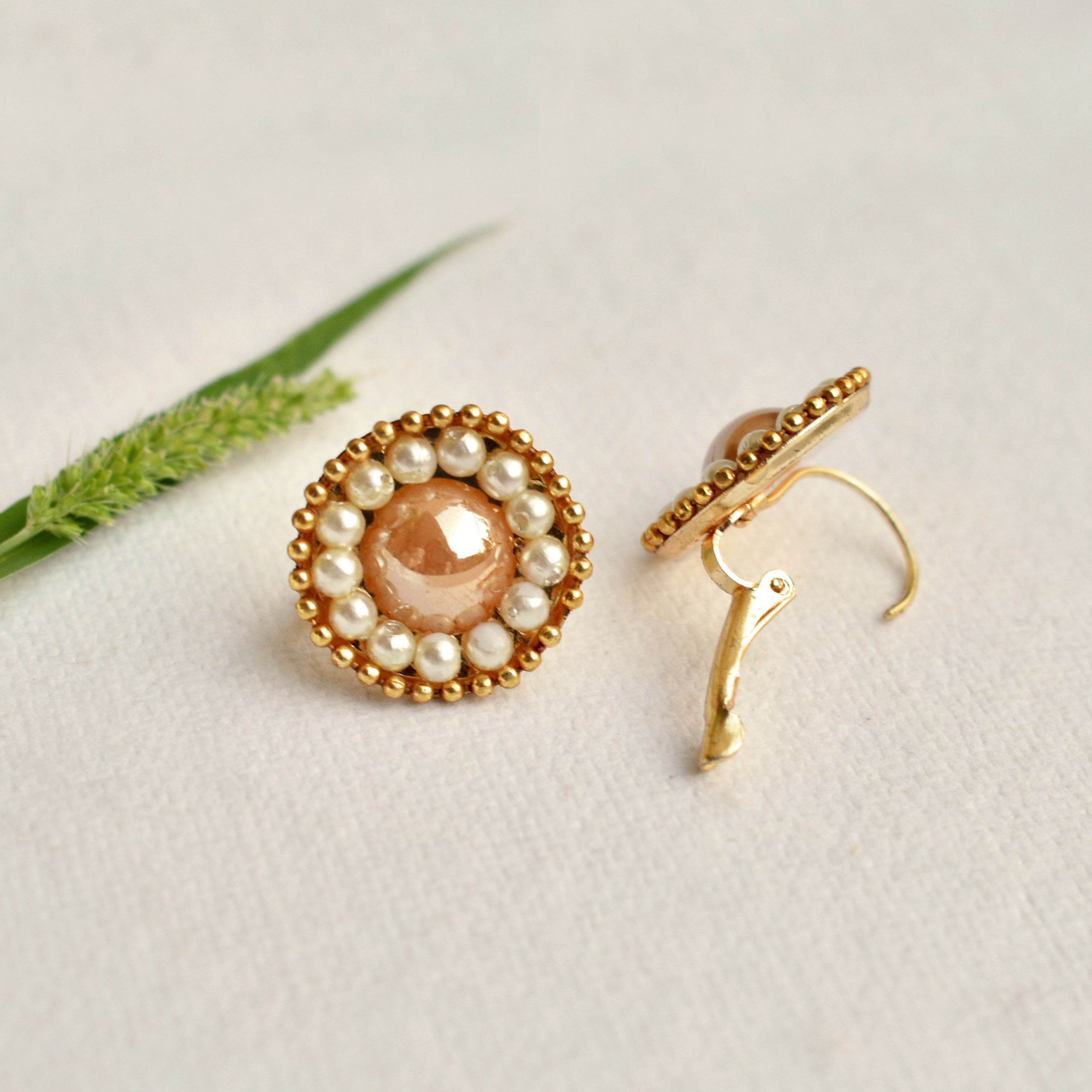 Traditional Kundan earrings in gold-tone, perfect for weddings and festive wear