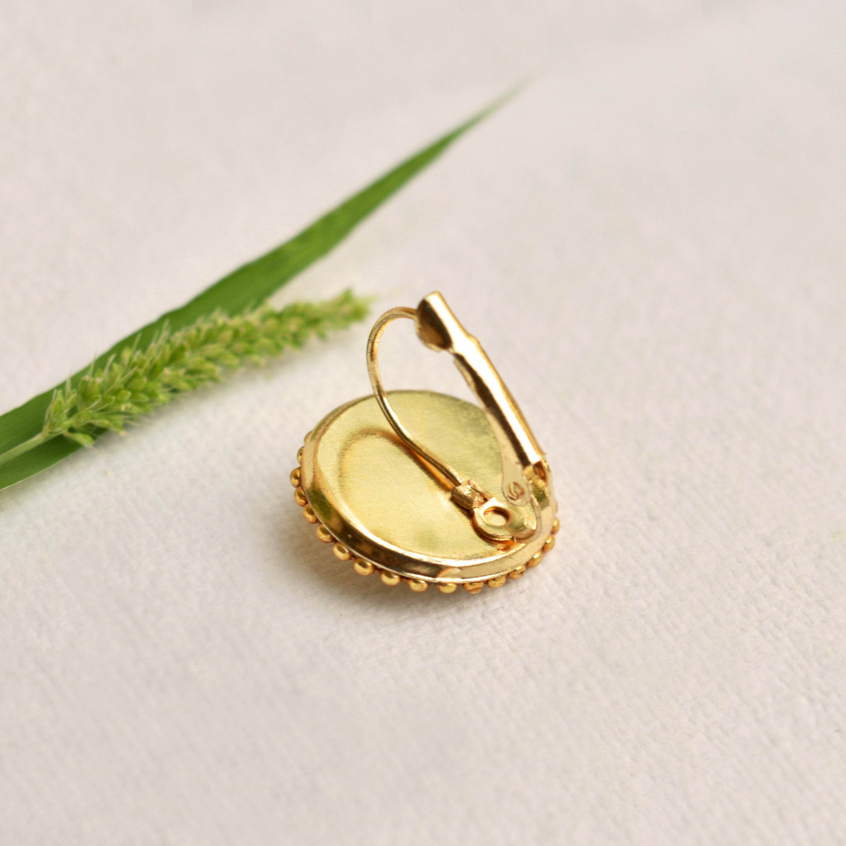 Traditional Kundan earrings in gold-tone, perfect for weddings and festive wear