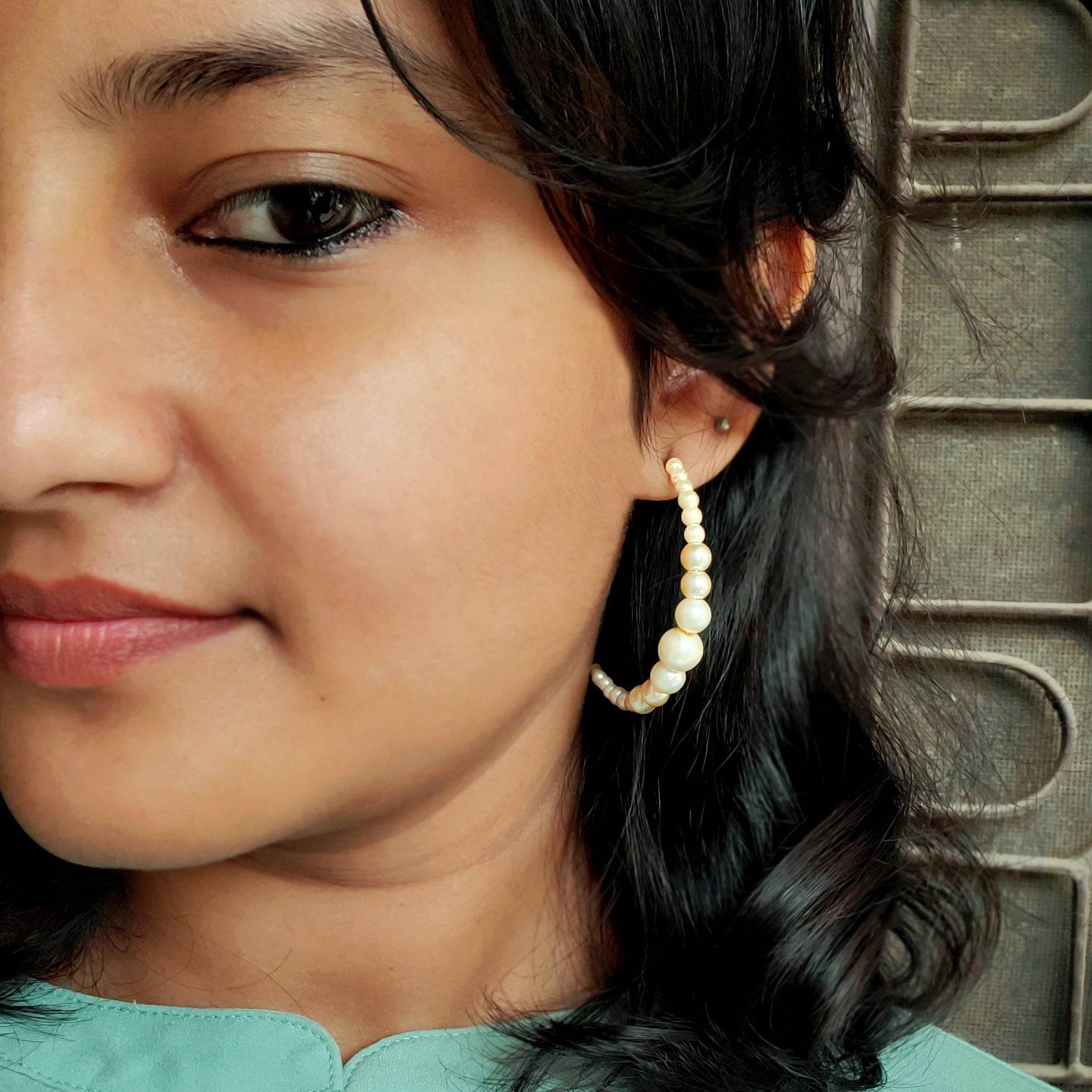 Traditional Kundan earrings in gold-tone, perfect for weddings and festive wear