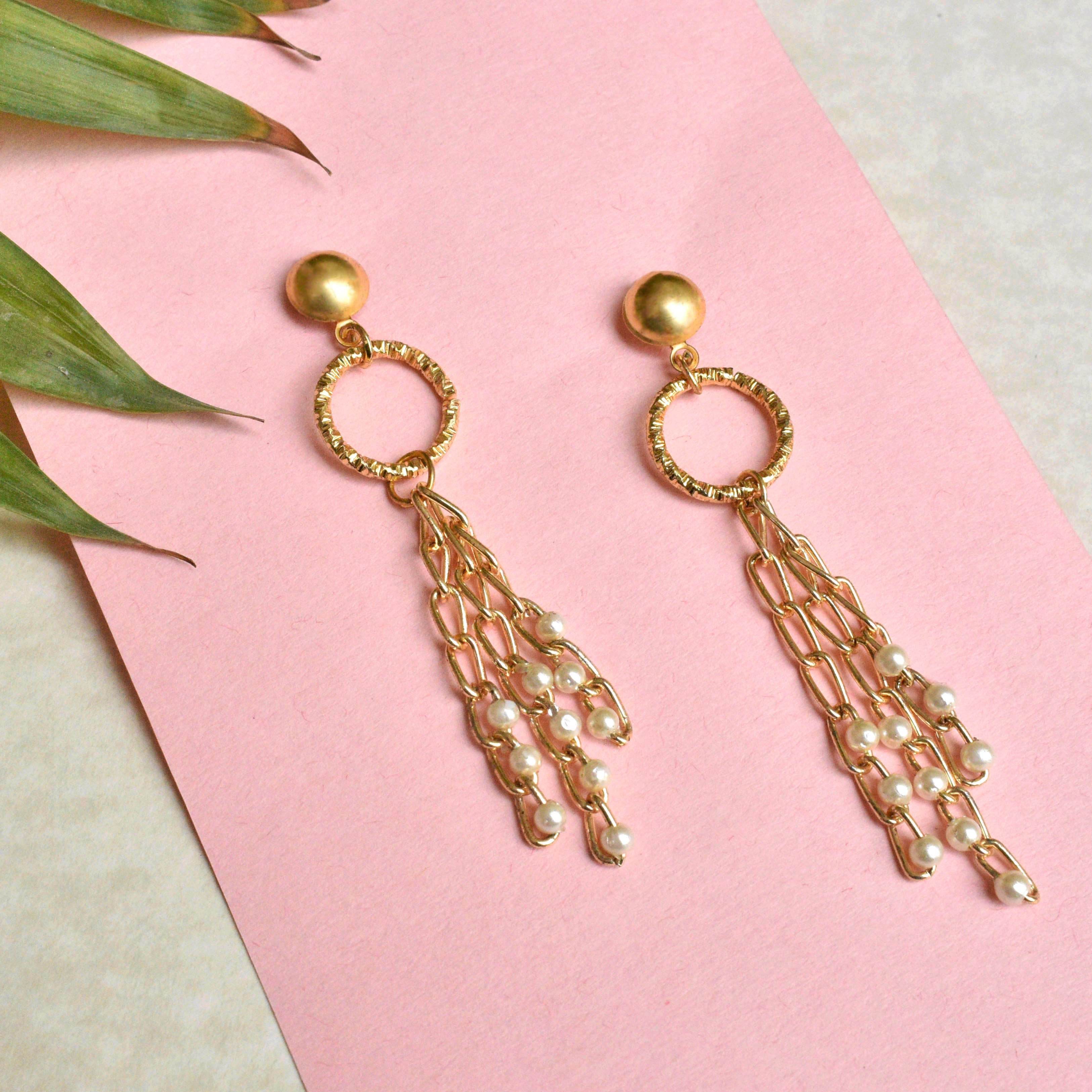 Traditional Kundan earrings in gold-tone, perfect for weddings and festive wear