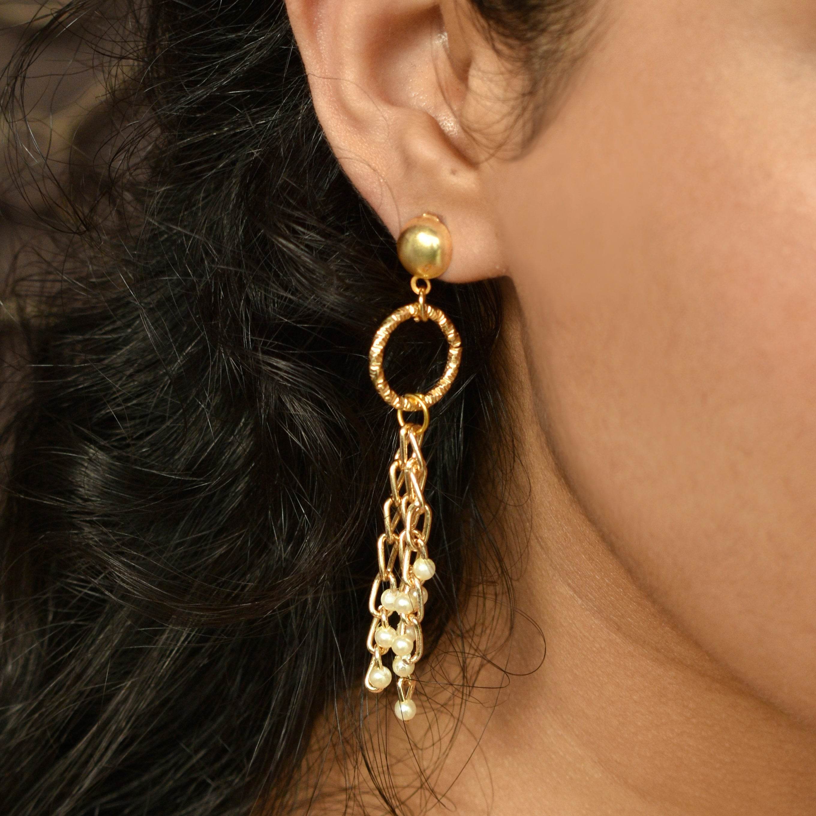 Traditional Kundan earrings in gold-tone, perfect for weddings and festive wear