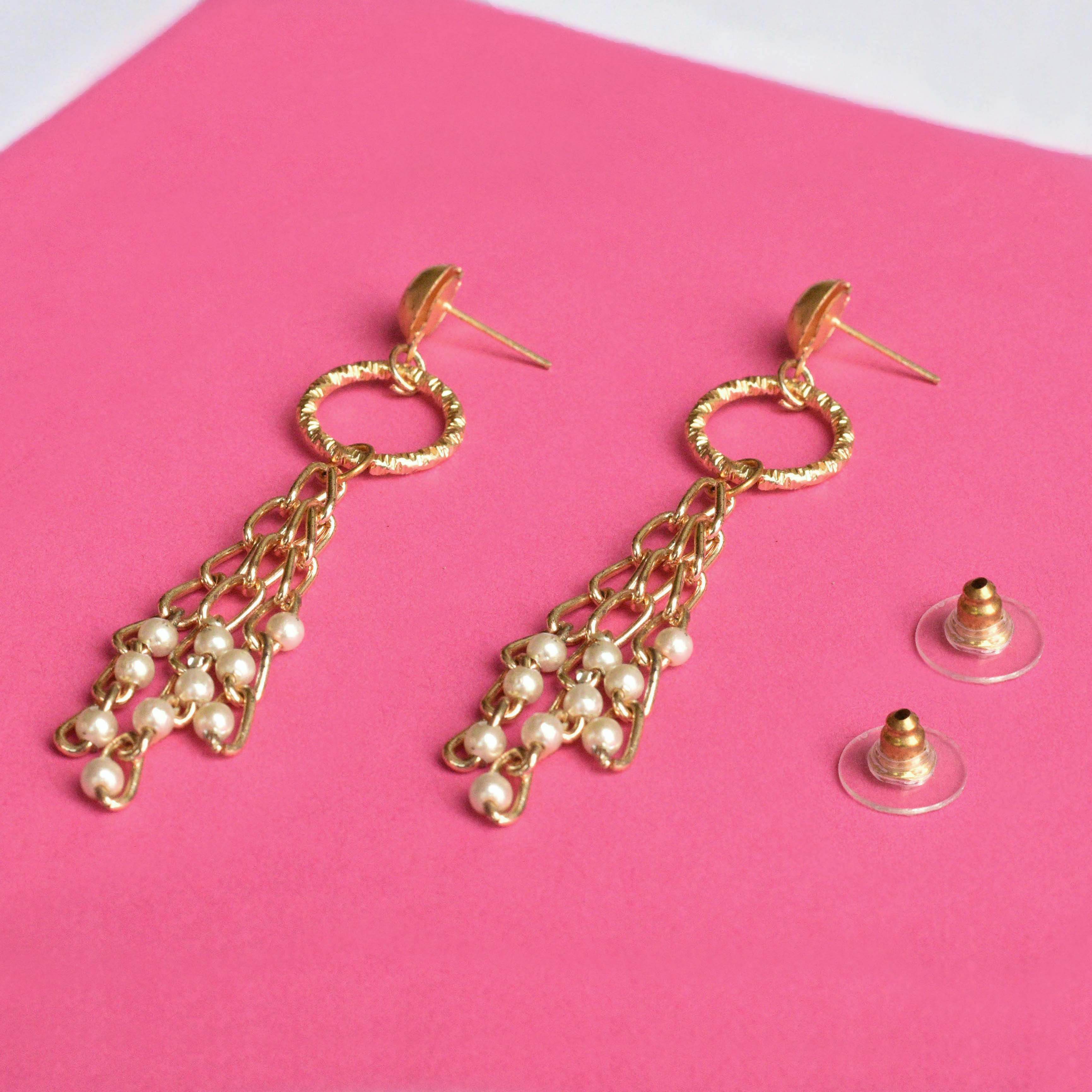 Traditional Kundan earrings in gold-tone, perfect for weddings and festive wear