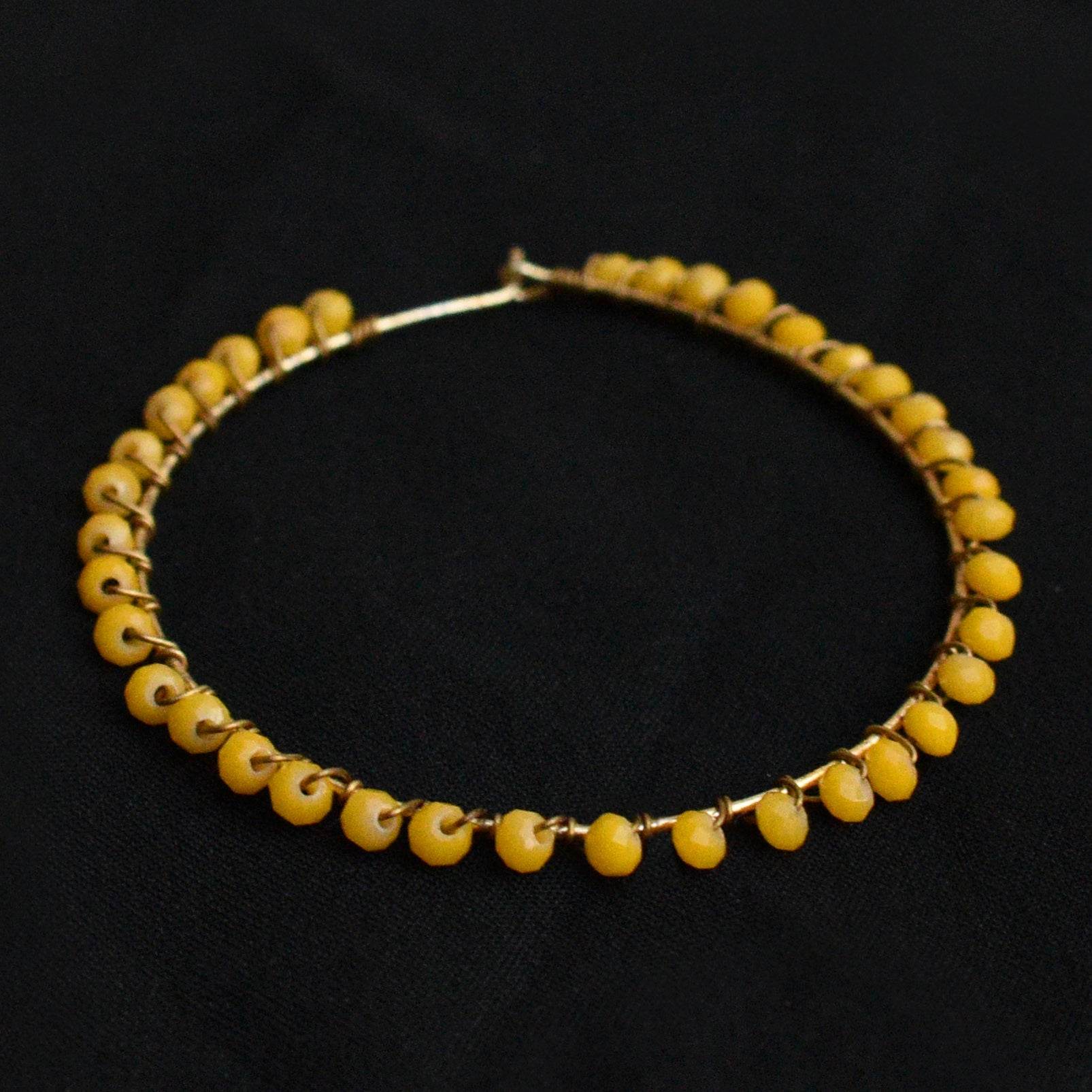 Traditional Kundan earrings in gold-tone, perfect for weddings and festive wear