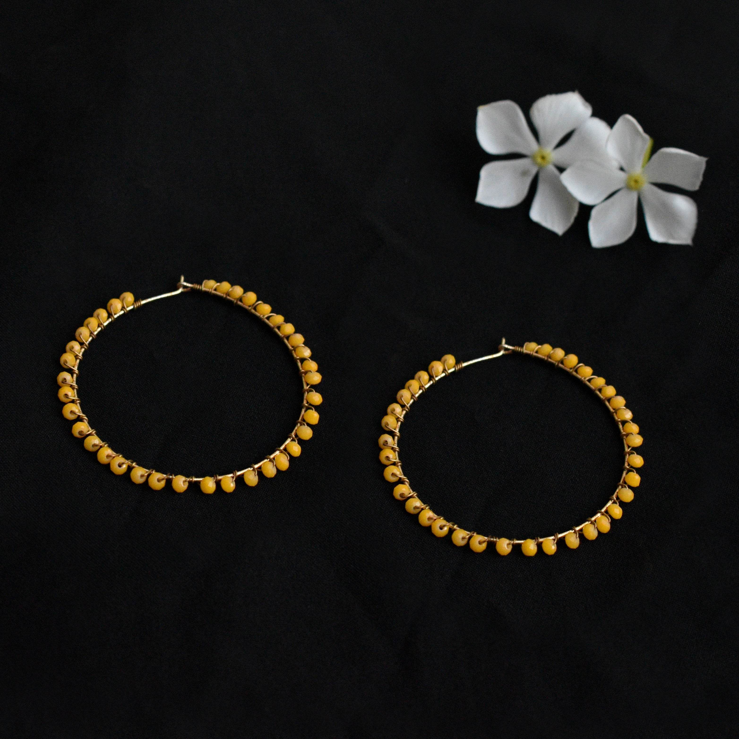 Traditional Kundan earrings in gold-tone, perfect for weddings and festive wear