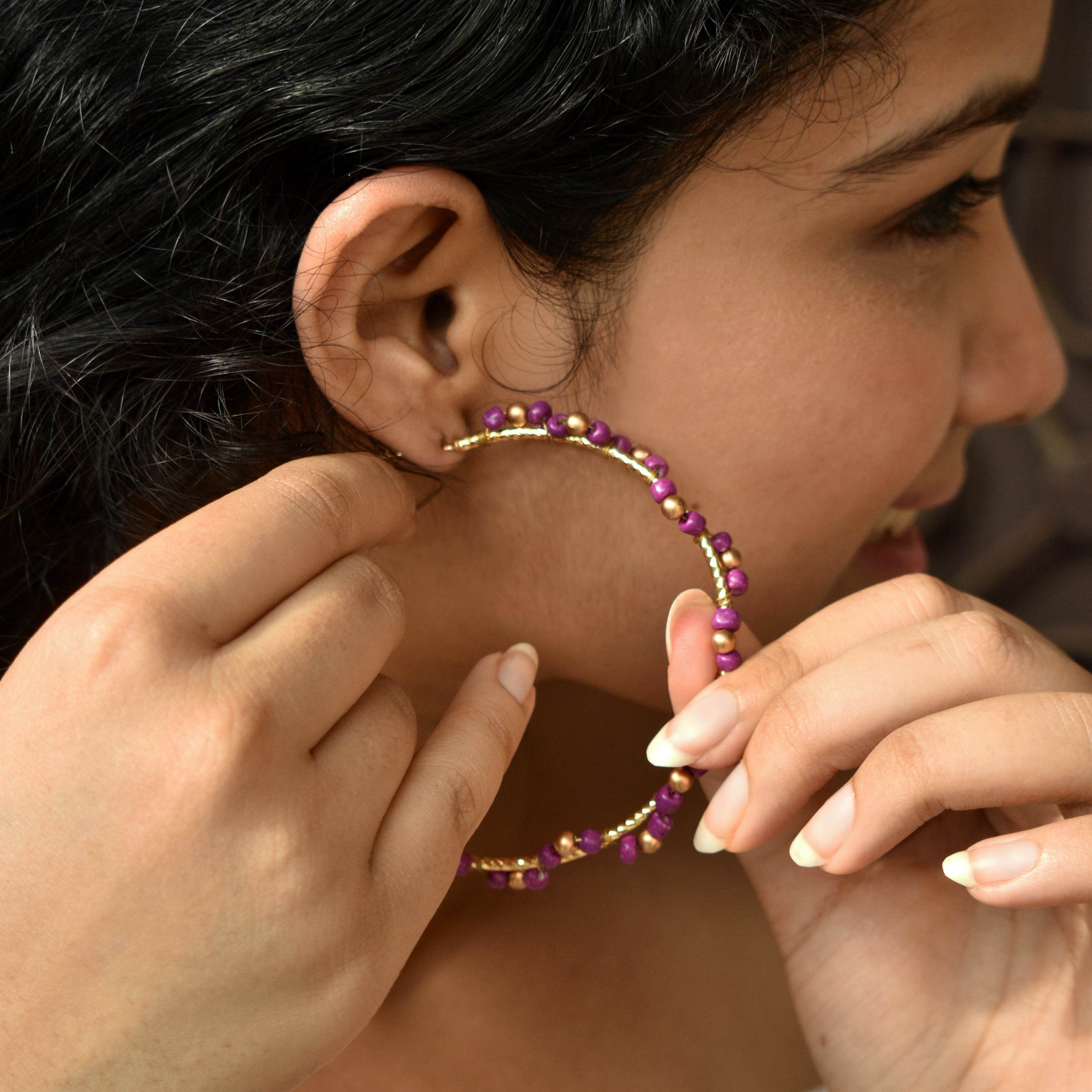 Traditional Kundan earrings in gold-tone, perfect for weddings and festive wear