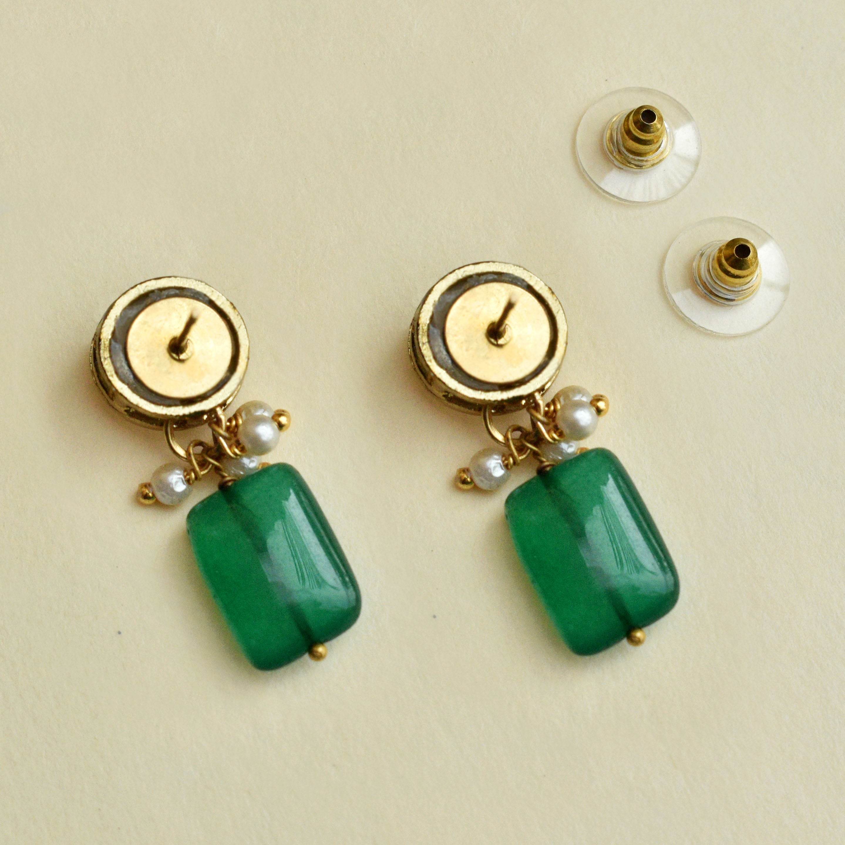 Traditional Kundan earrings in gold-tone, perfect for weddings and festive wear