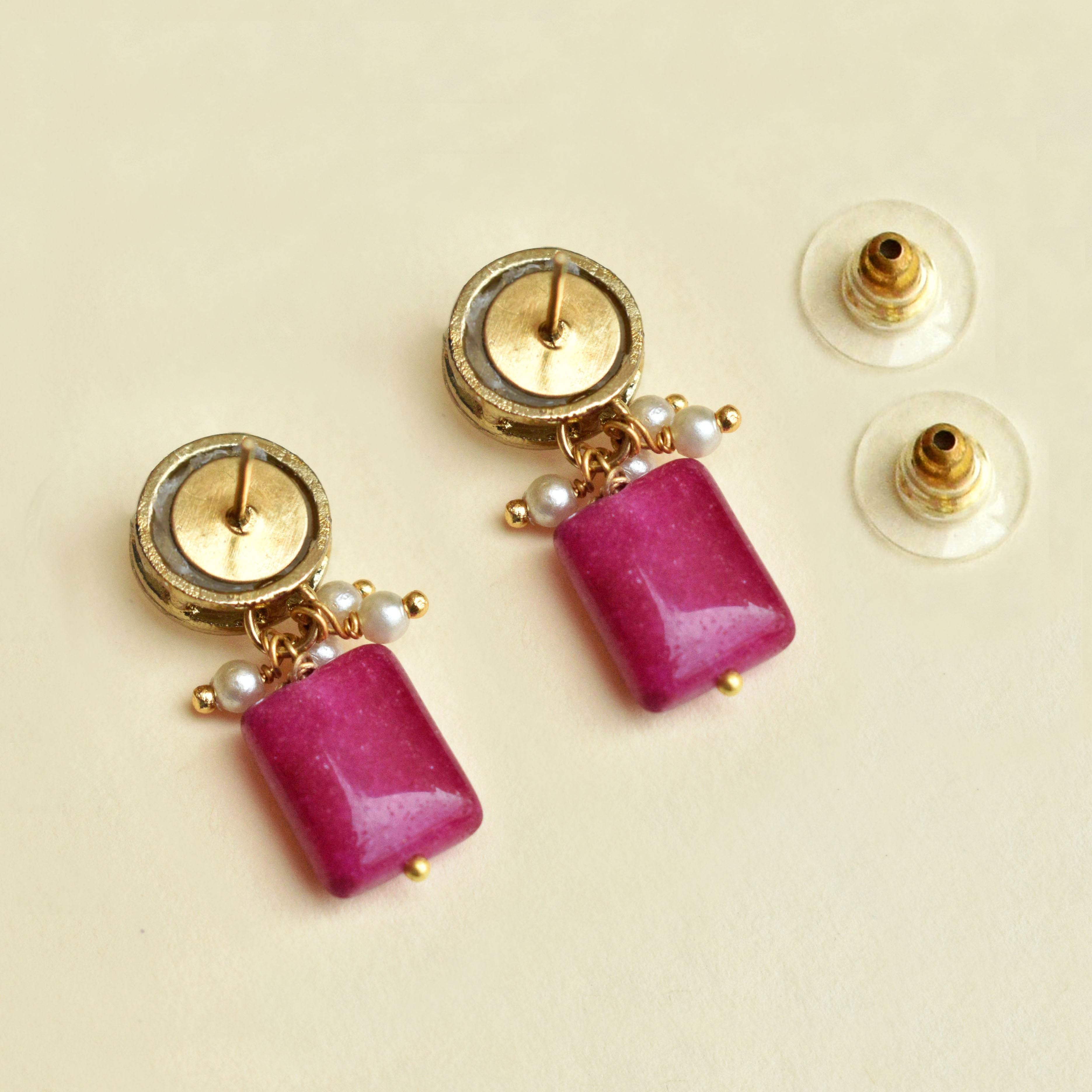 Traditional Kundan earrings in gold-tone, perfect for weddings and festive wear