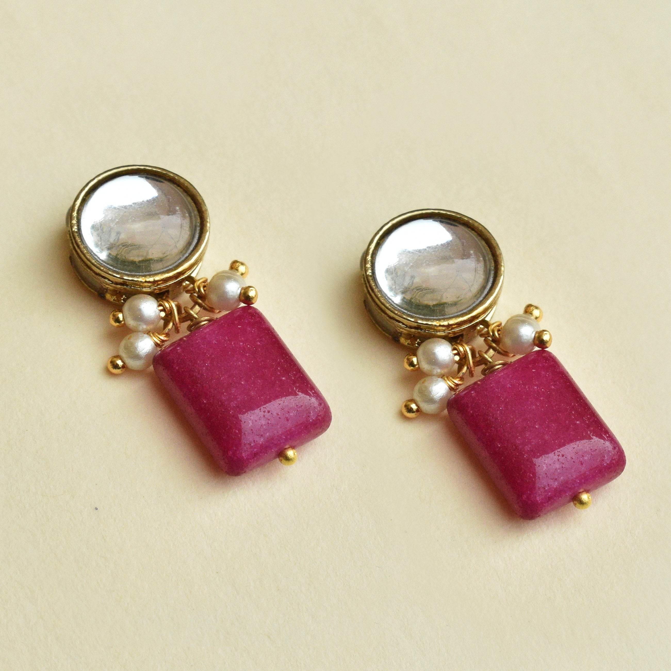 Traditional Kundan earrings in gold-tone, perfect for weddings and festive wear