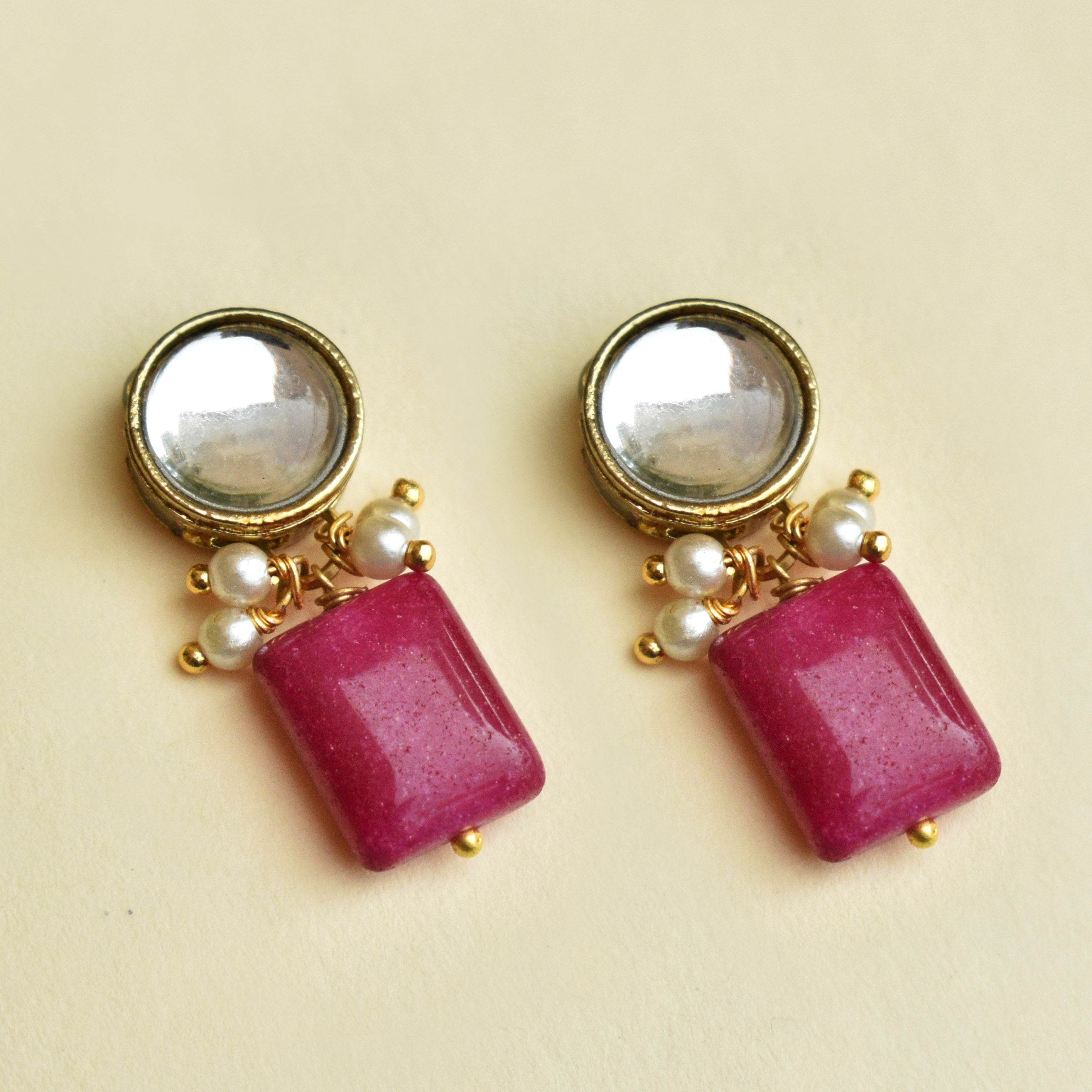 Traditional Kundan earrings in gold-tone, perfect for weddings and festive wear