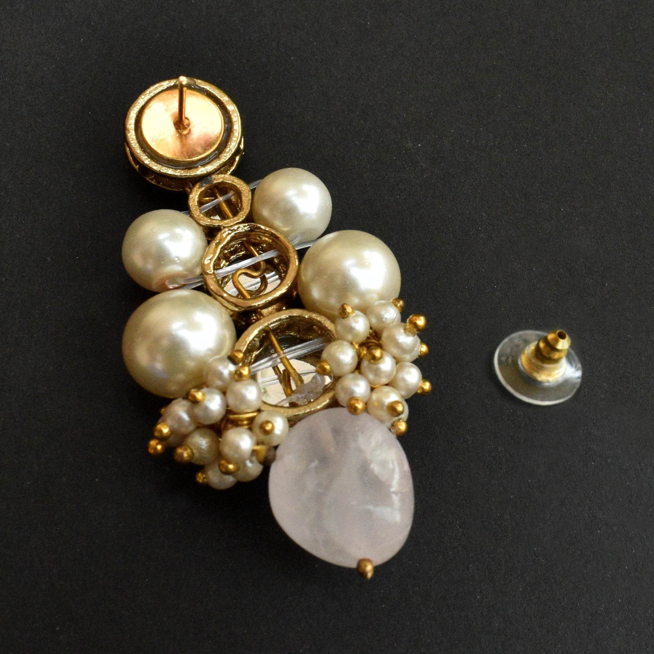 Traditional Kundan earrings in gold-tone, perfect for weddings and festive wear
