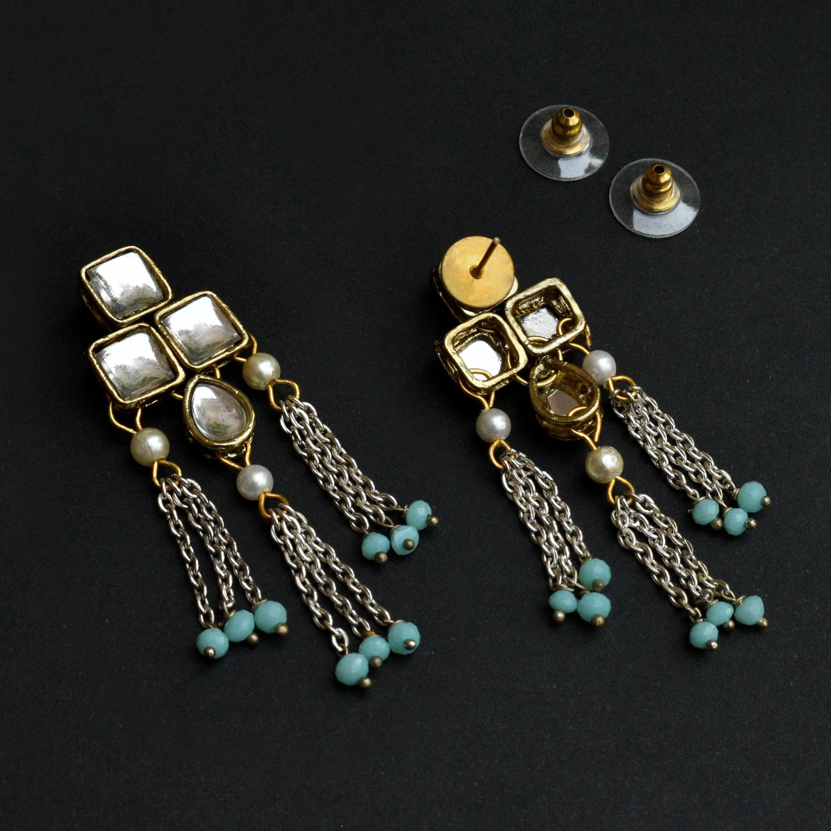 Traditional Kundan earrings in gold-tone, perfect for weddings and festive wear