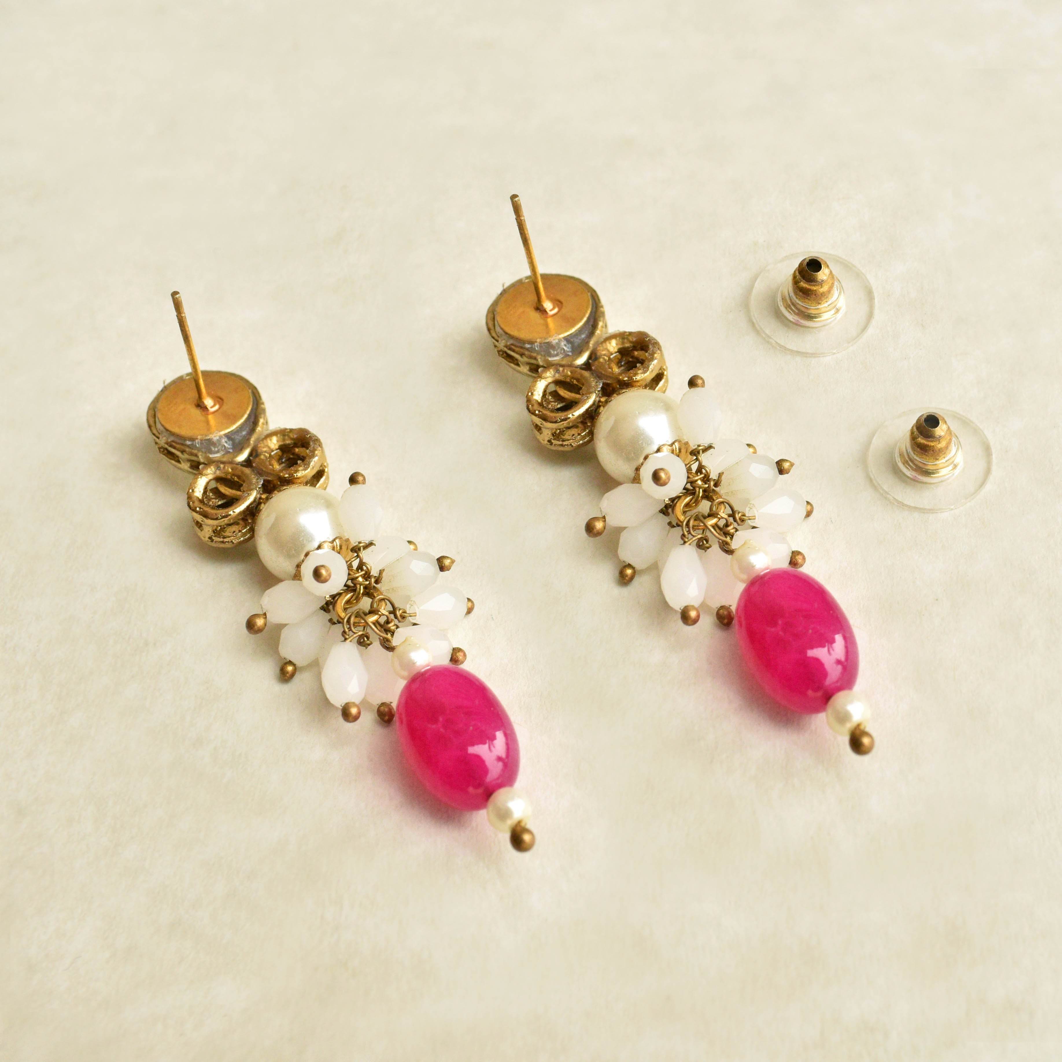 Traditional Kundan earrings in gold-tone, perfect for weddings and festive wear