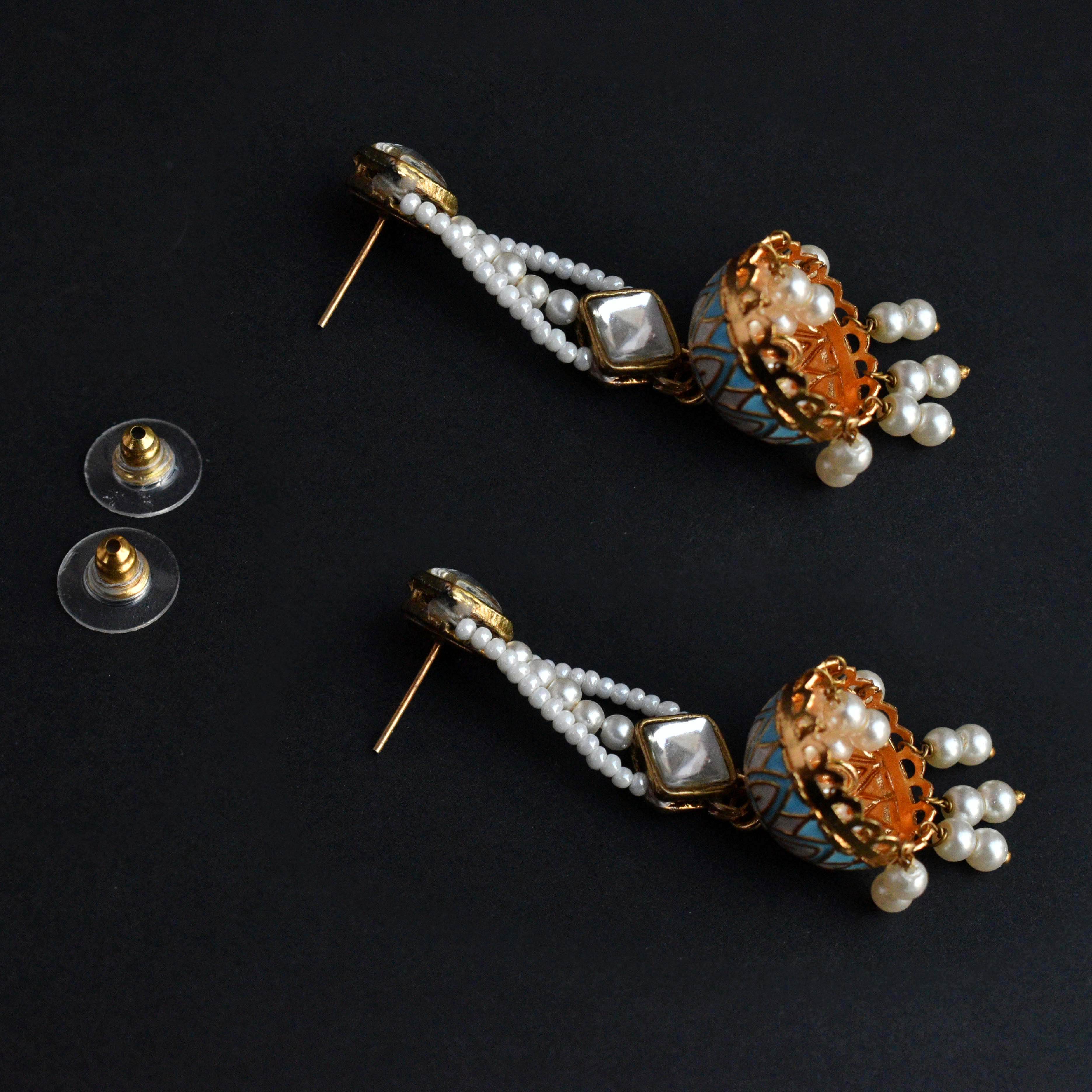 Traditional Kundan earrings in gold-tone, perfect for weddings and festive wear