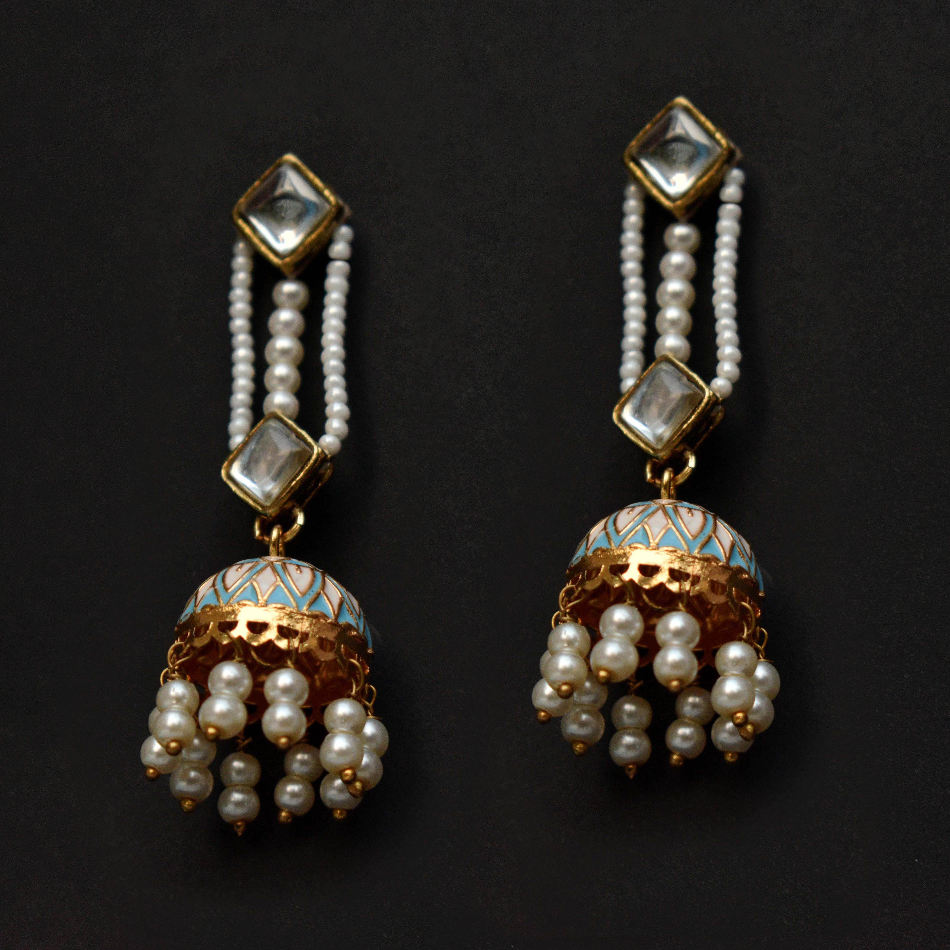 Traditional Kundan earrings in gold-tone, perfect for weddings and festive wear