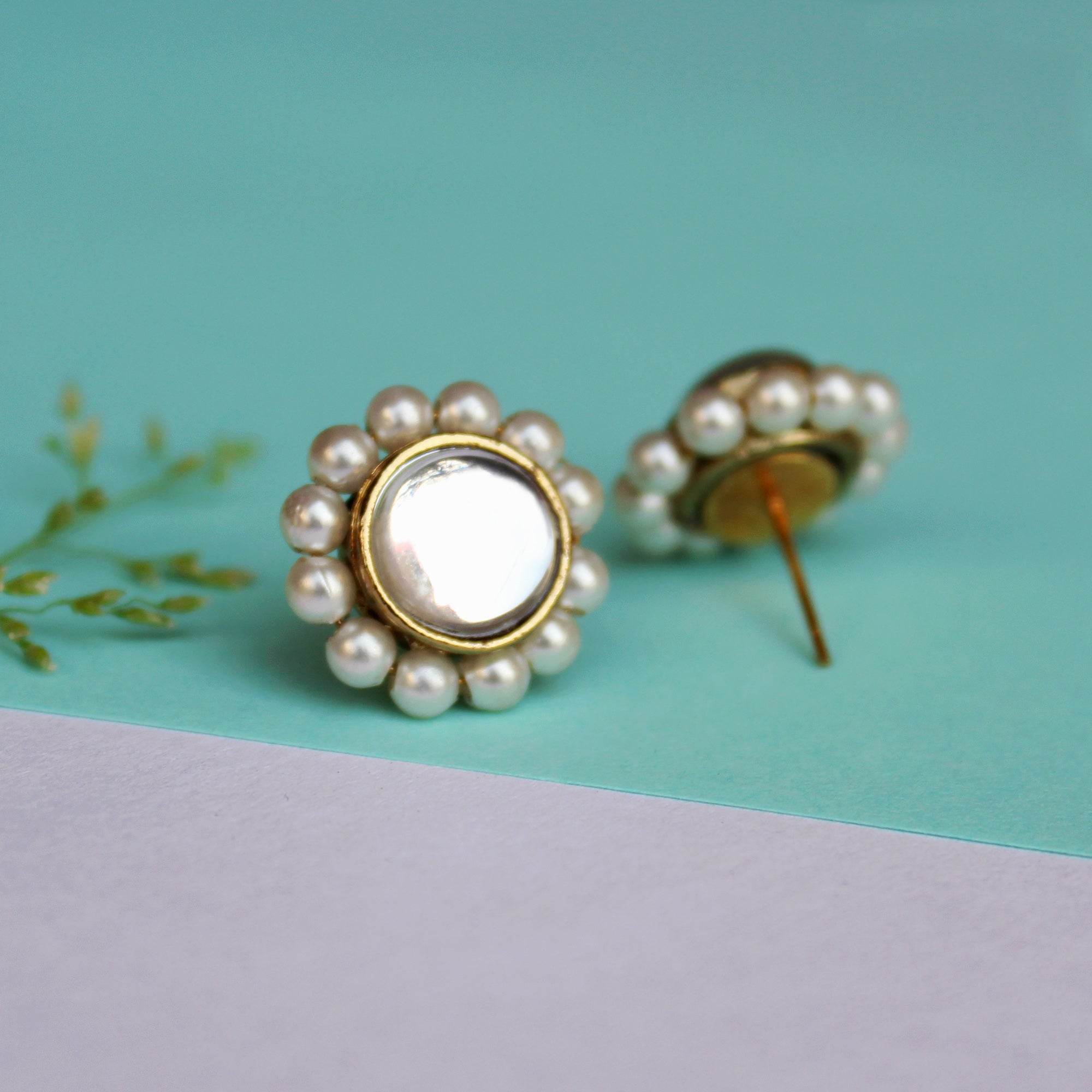 Traditional Kundan earrings in gold-tone, perfect for weddings and festive wear