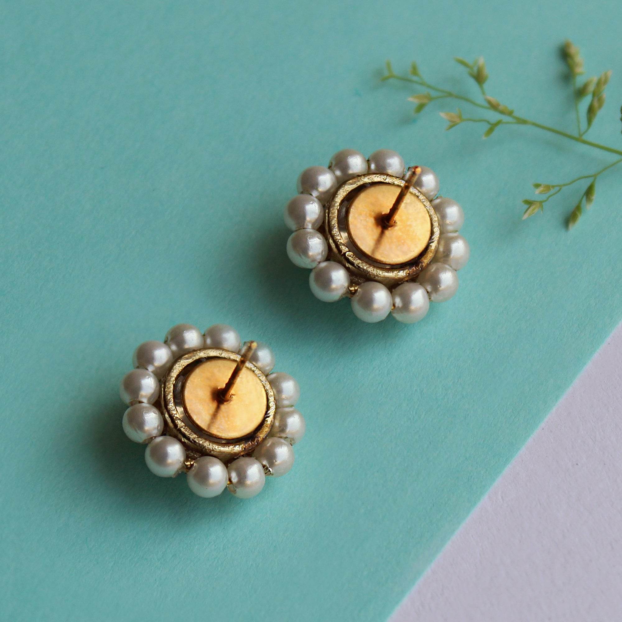 Traditional Kundan earrings in gold-tone, perfect for weddings and festive wear