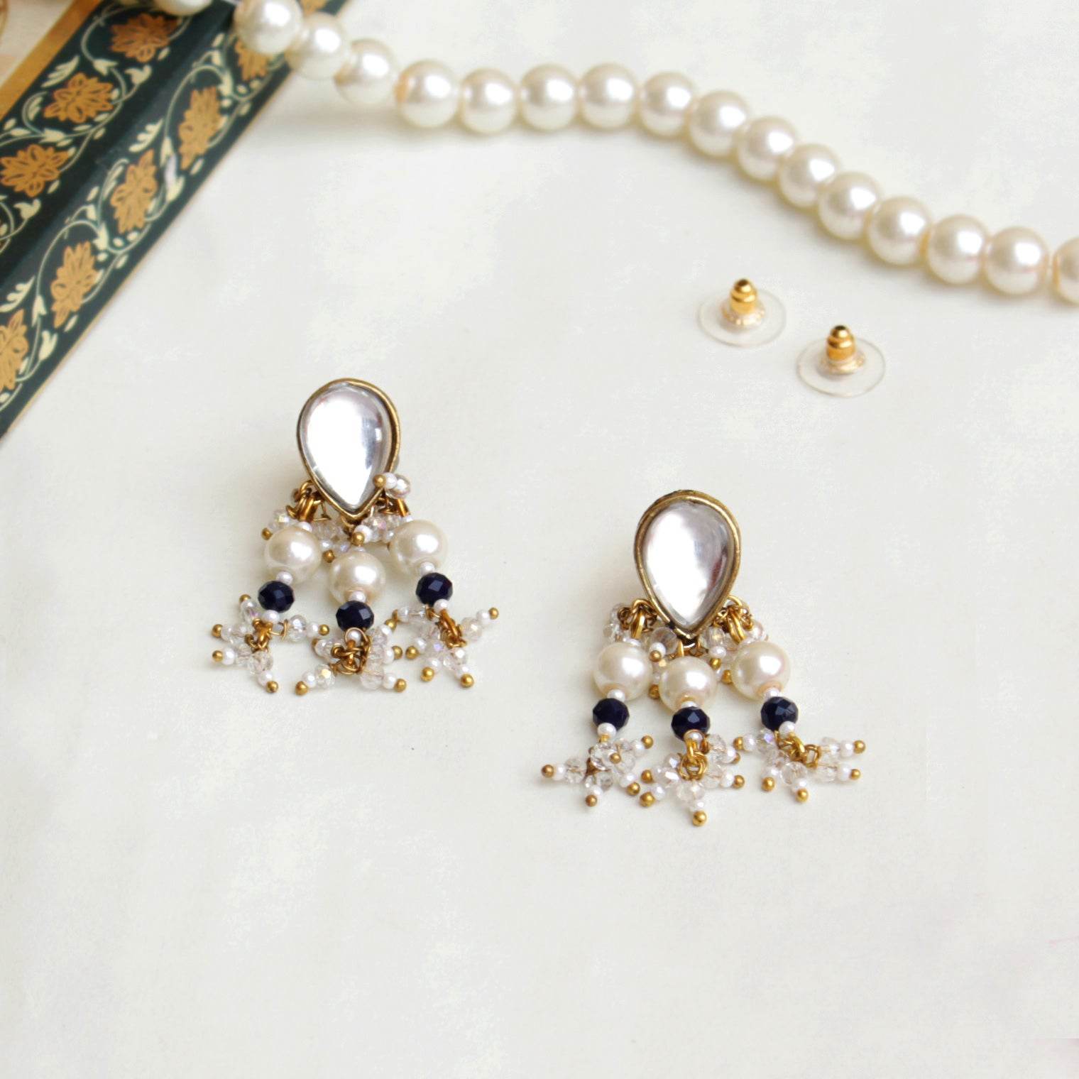 Traditional Kundan earrings in gold-tone, perfect for weddings and festive wear
