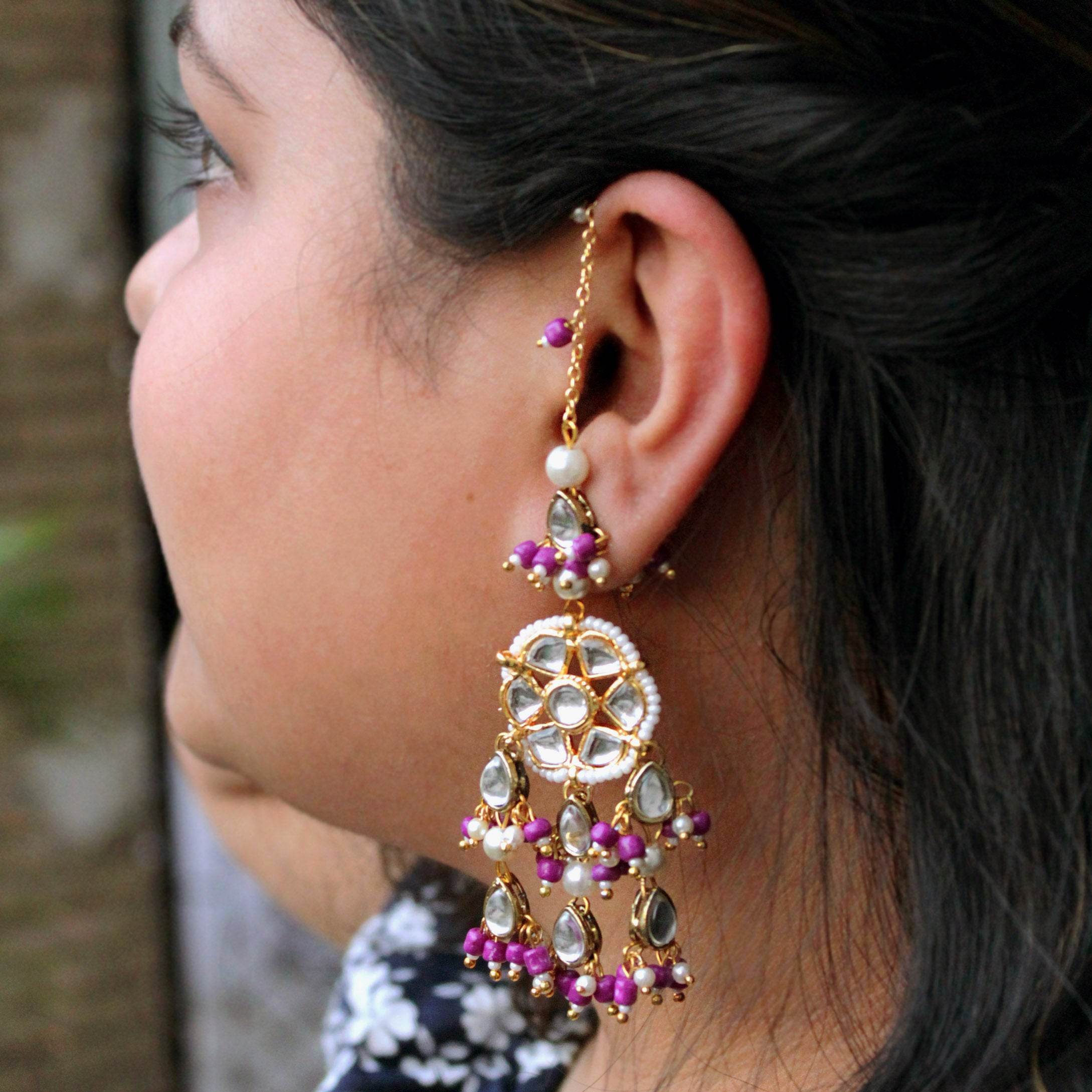 Traditional Kundan earrings in gold-tone, perfect for weddings and festive wear