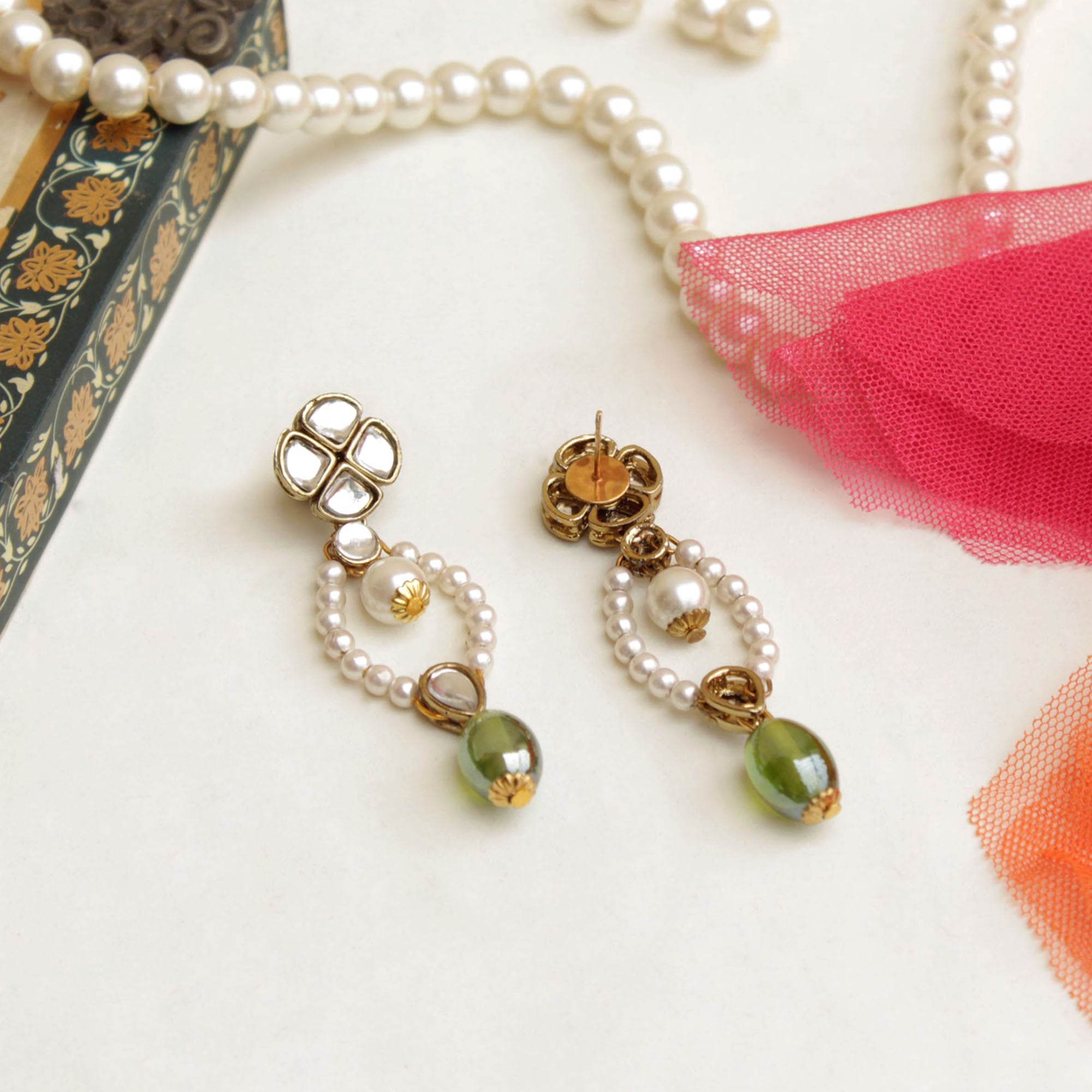 Traditional Kundan earrings in gold-tone, perfect for weddings and festive wear